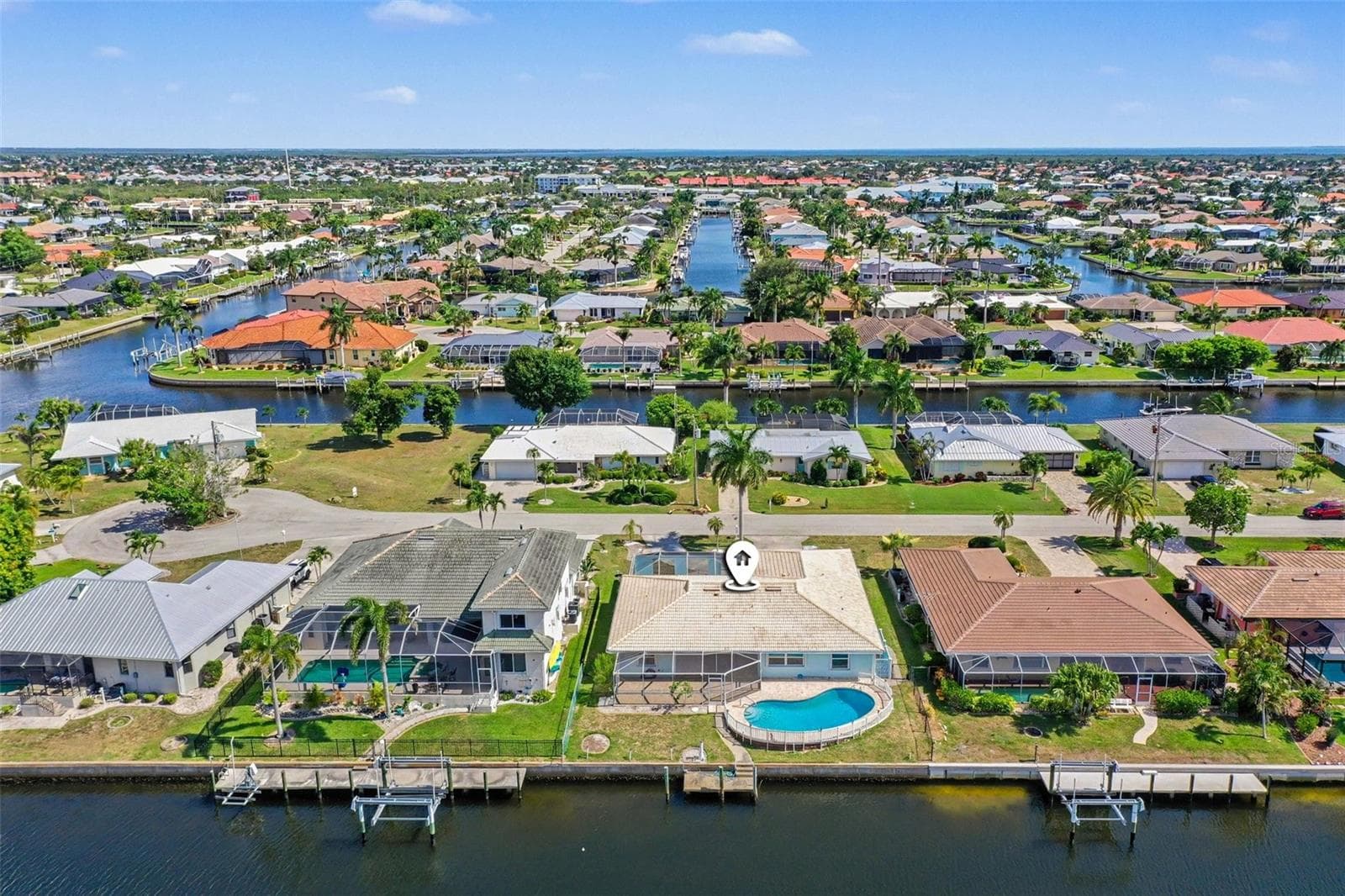 Aerial view facing south, Punta Gorda Isles is expansive - 548 BELVEDERE CT, PUNTA GORDA