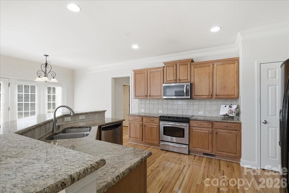 Enough space for multiple people to be in the kitchen at the same time - 6055 Latta Springs Circle, Huntersville