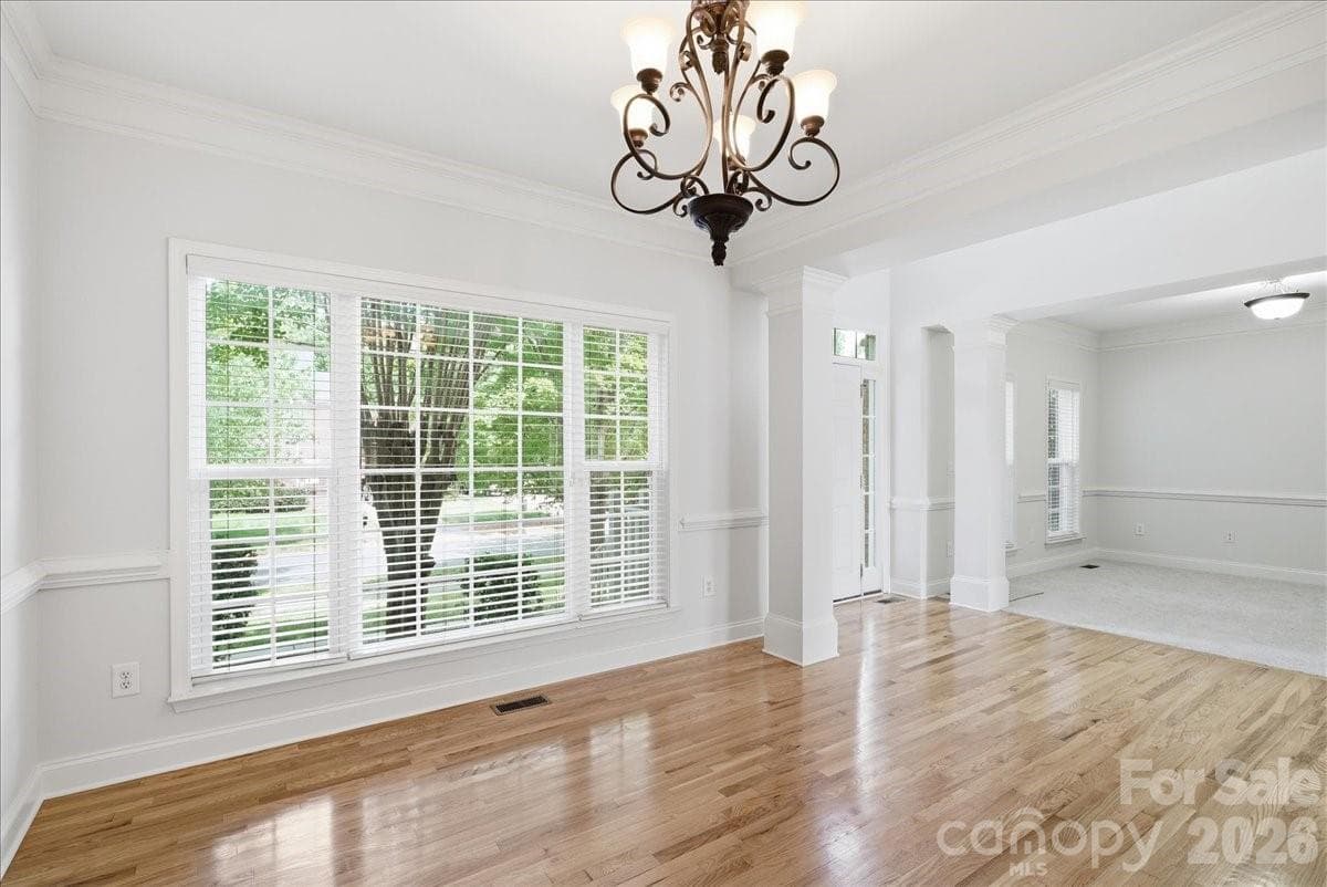 Dining room looking into living room - 6055 Latta Springs Circle, Huntersville