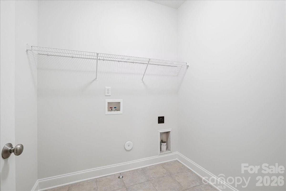 Upstairs laundry room - 6055 Latta Springs Circle, Huntersville