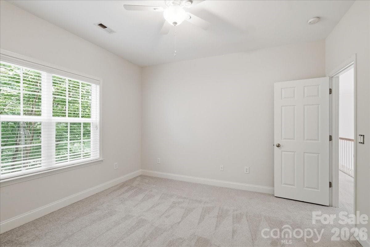 Bedroom 2, new carpet and ceiling fan - 6055 Latta Springs Circle, Huntersville