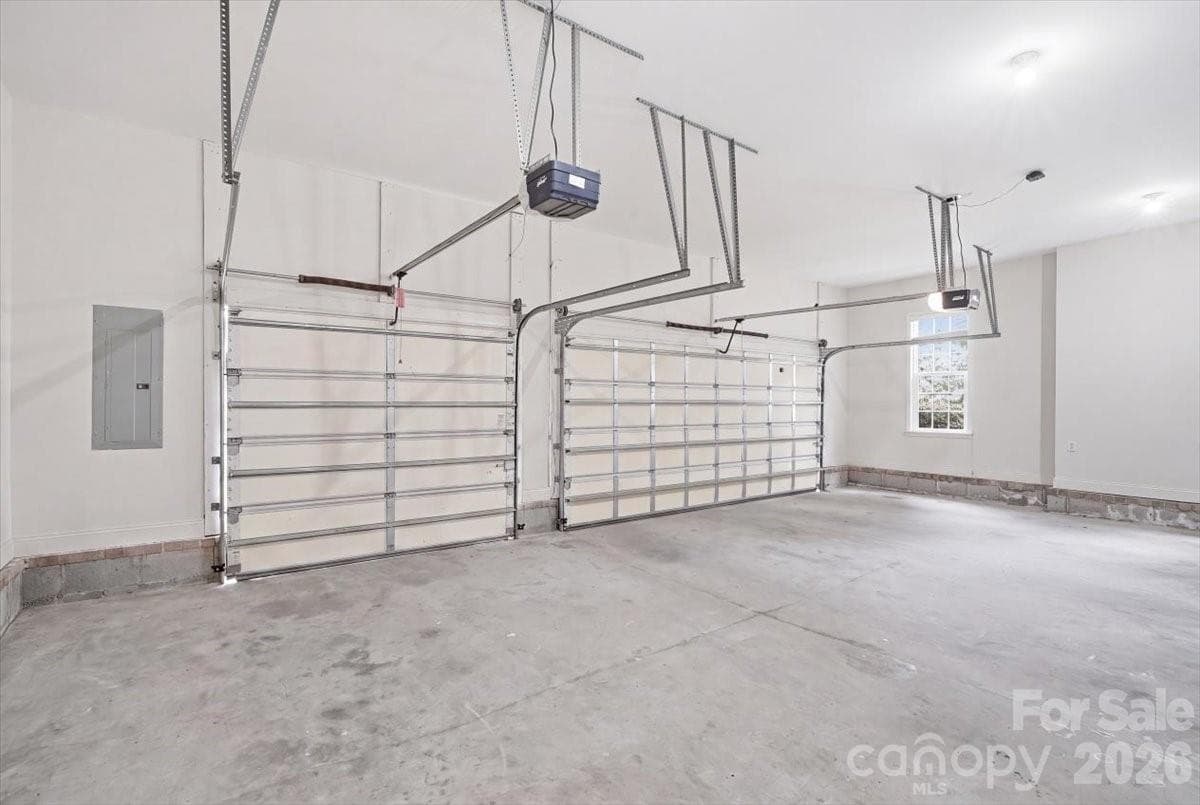 Huge 3 car garage. Highly desirable! - 6055 Latta Springs Circle, Huntersville