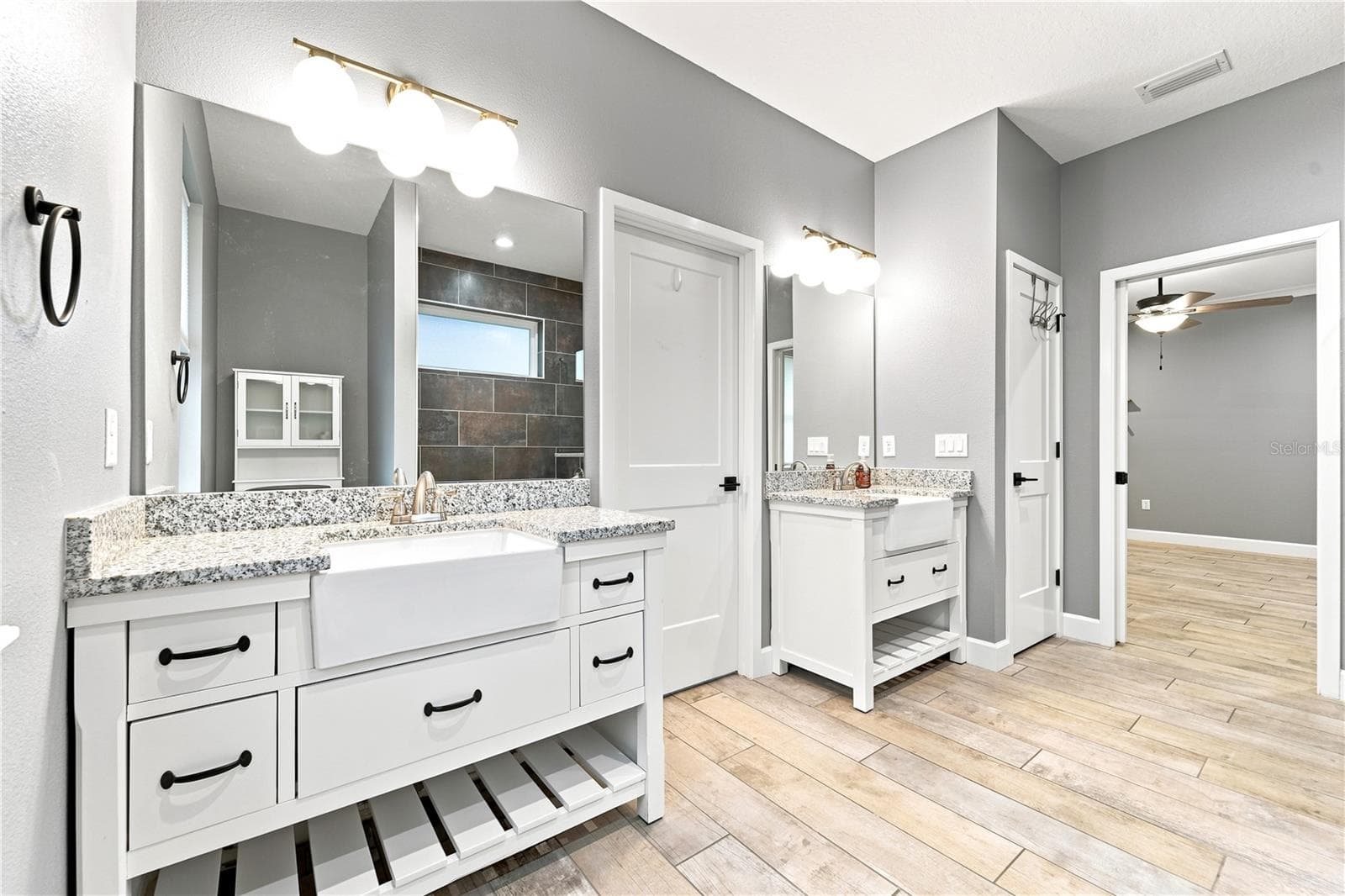 Double Split Vanities in primary bathroom - 125 LONGWOOD DR, OSTEEN