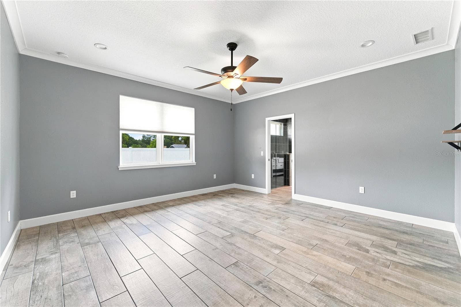 Primary Bedroom- 15.3 length x 15.5 width- all measurements must be verified. - 125 LONGWOOD DR, OSTEEN