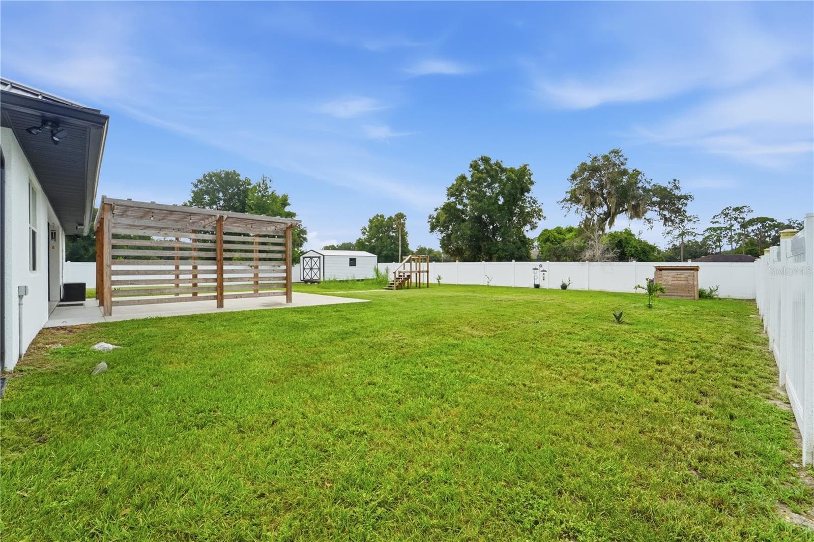 Fenced in backyard - 125 LONGWOOD DR, OSTEEN