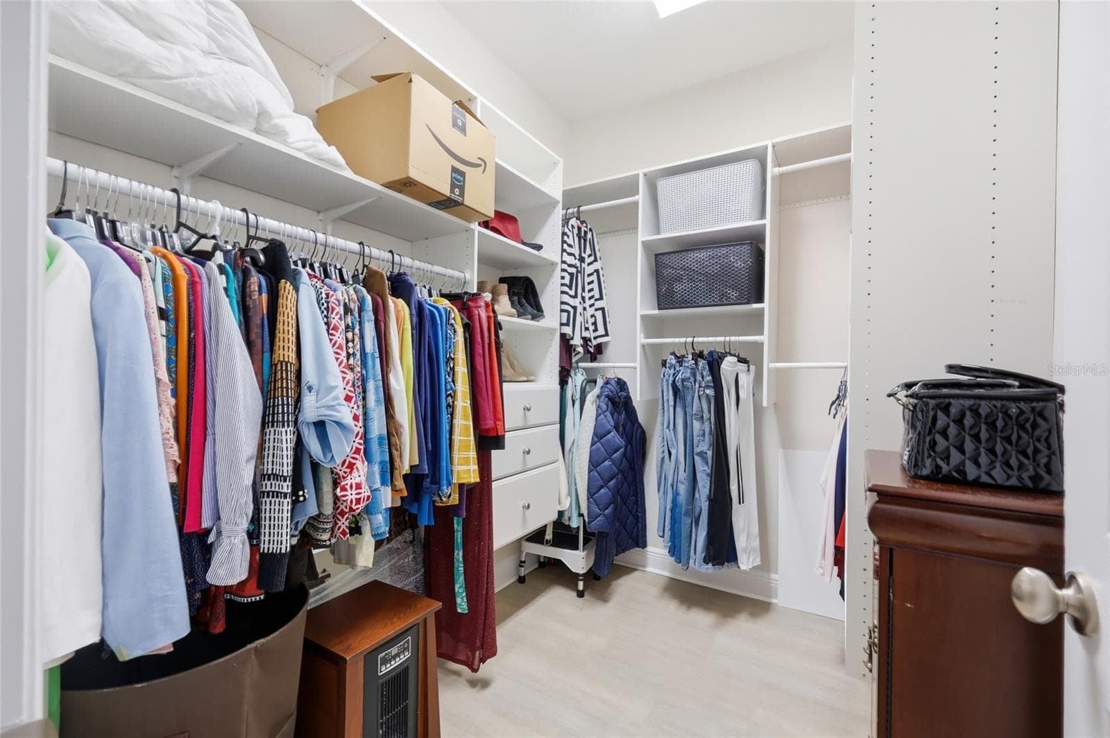 California Style Walk In Closet inside the Primary Bedroom #2 - 1020 SAILING BAY DR, CLERMONT