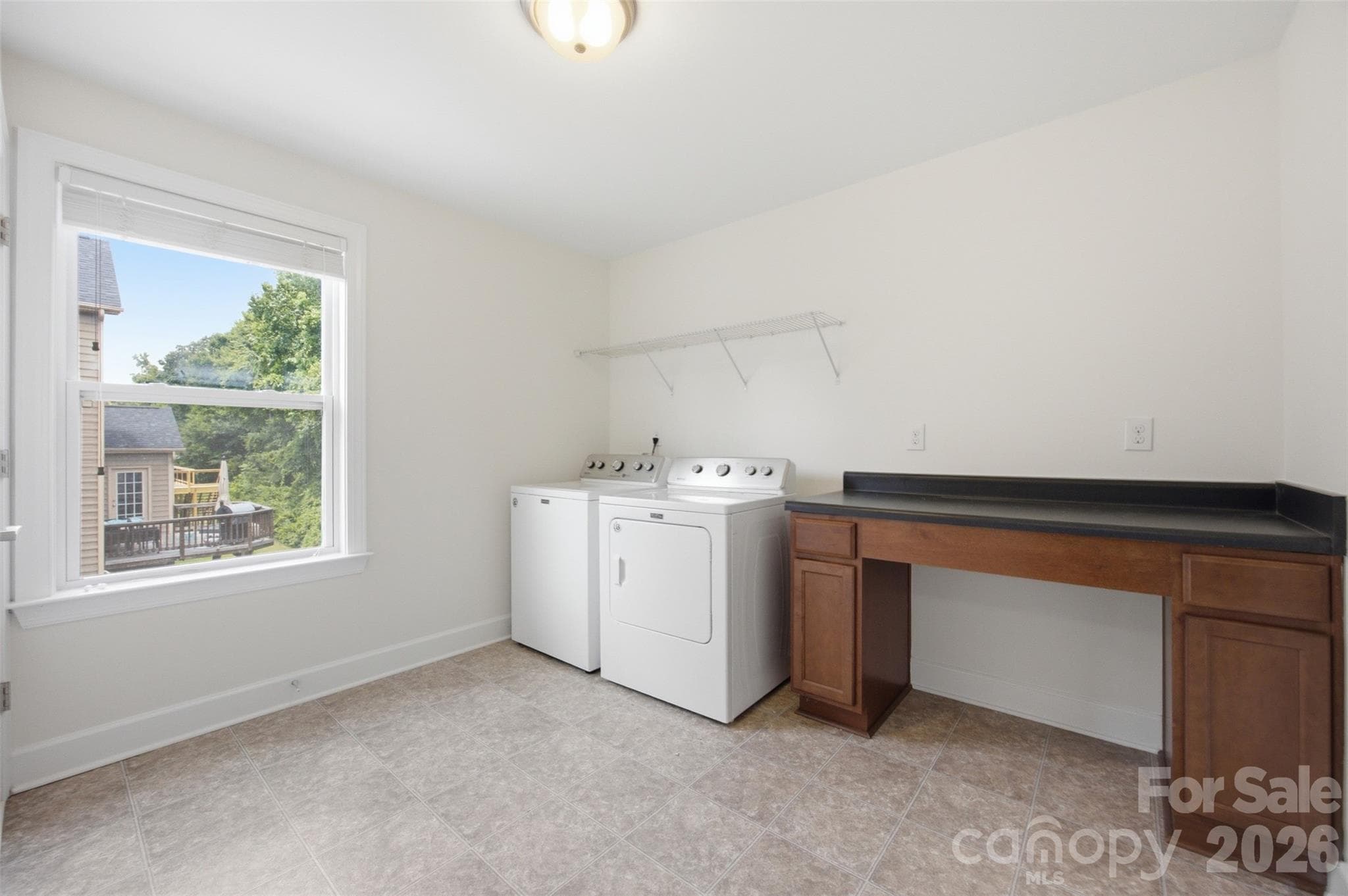 Large laundry room with folding station - 423 Fischer Road, Fort Mill