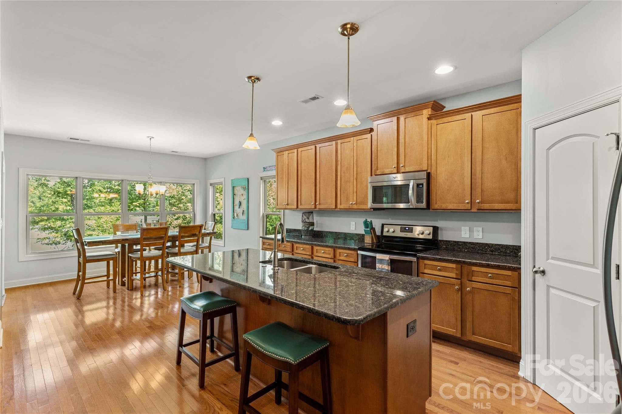Kitchen equipped with stainless steel appliances and an island. - 2051 Great North Road, Winnsboro