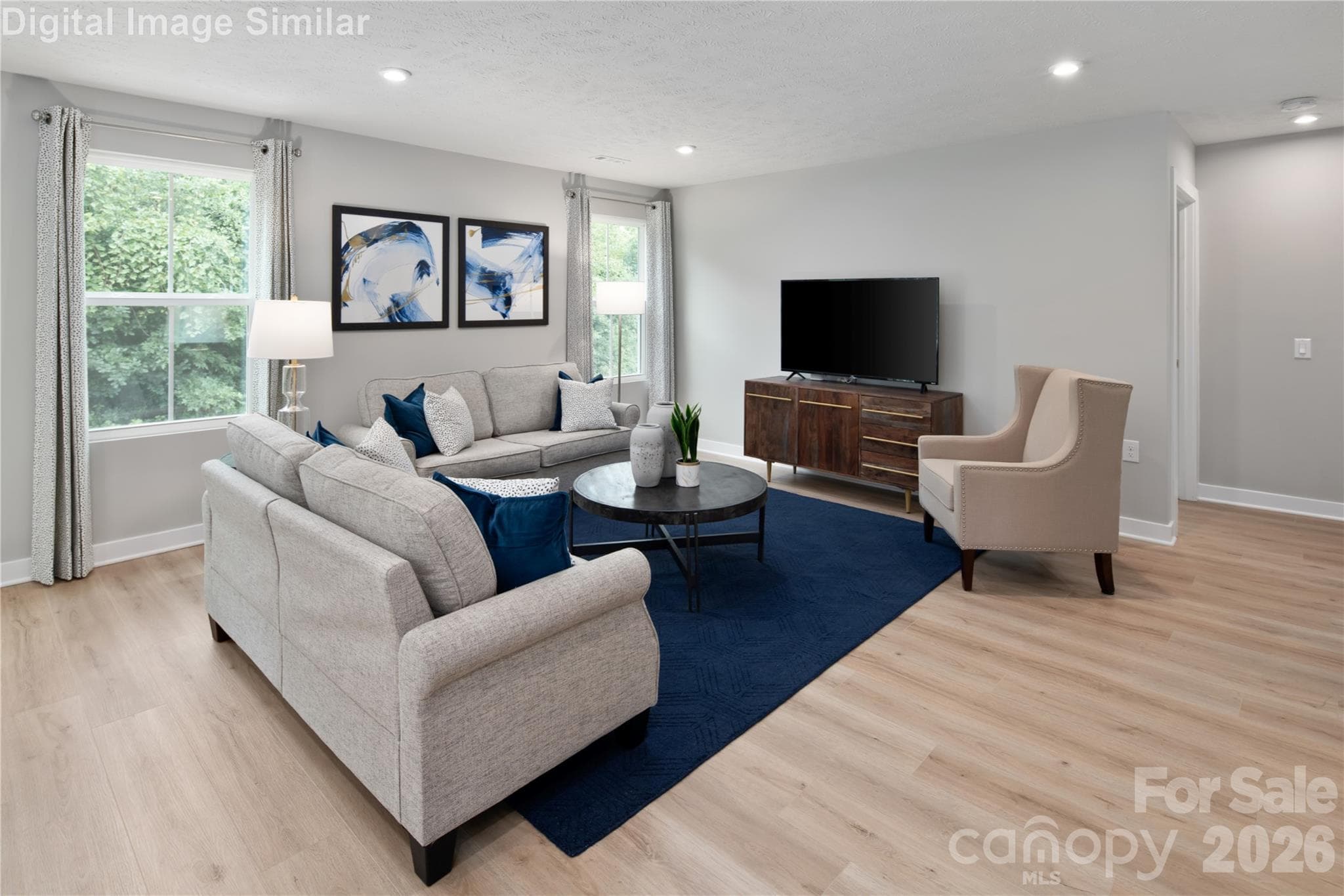 Sunlit great room offers the perfect setting to gather, unwind, and enjoy everyday moments together. - 333 Linwood Estates Drive, Lexington