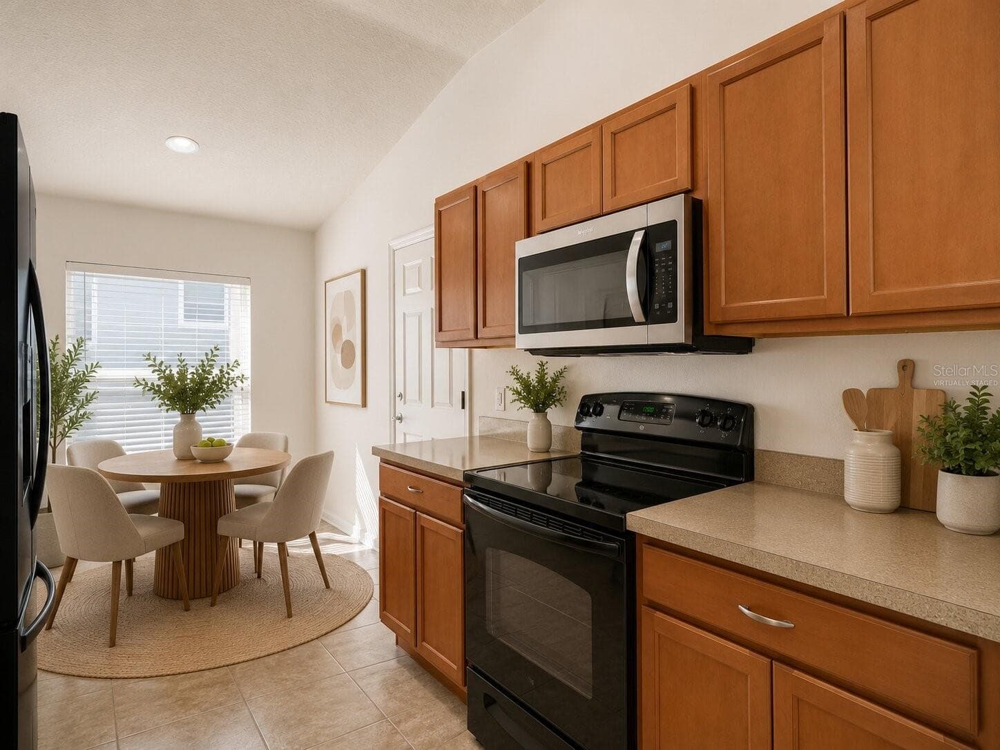 Virtually Staged Kitchen and the view of eating space - 2972 SANTA MARIA AVE, CLERMONT