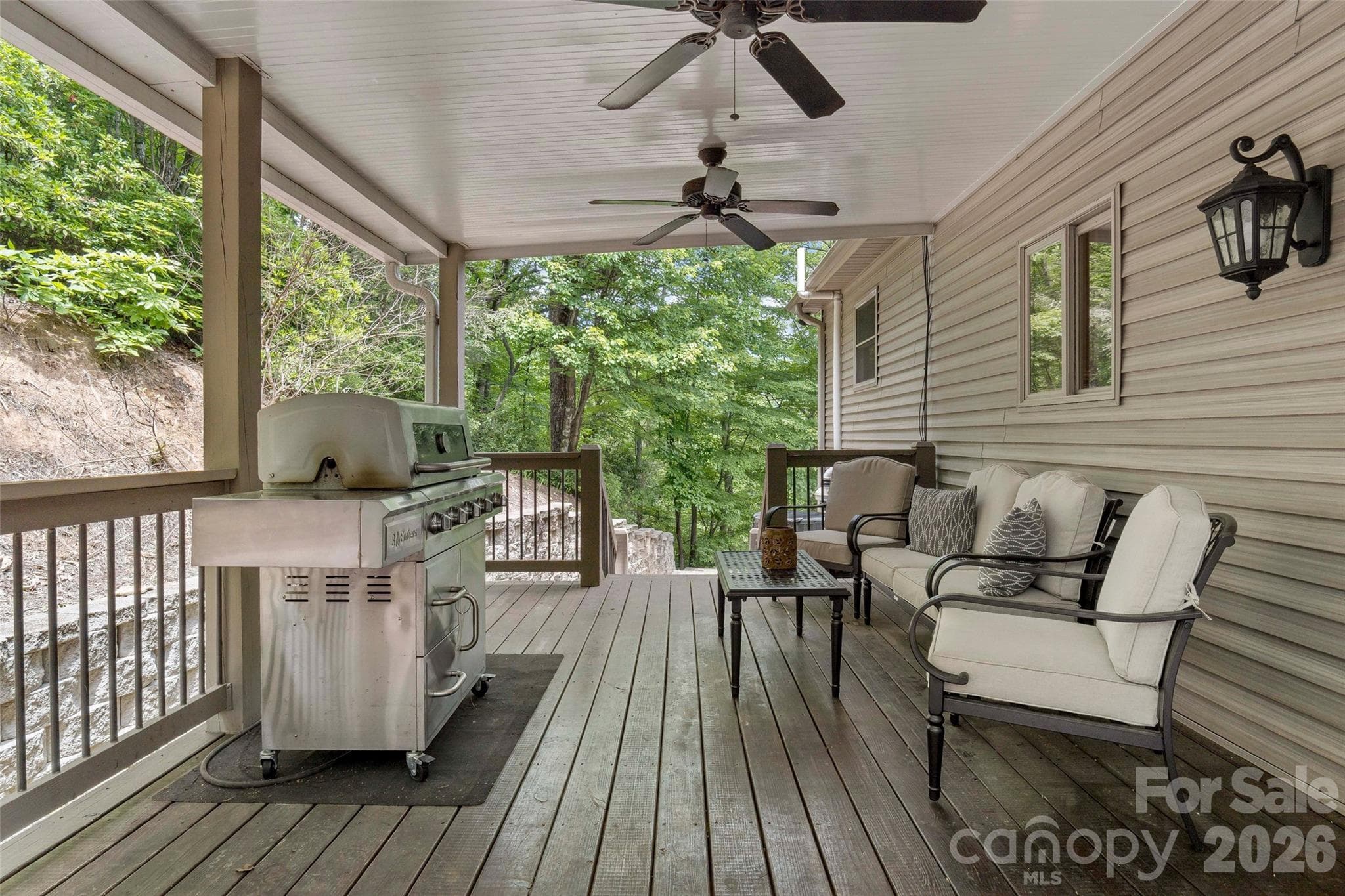 Covered deck off of kitchen. - 179 Rock Spring Road, Lake Lure