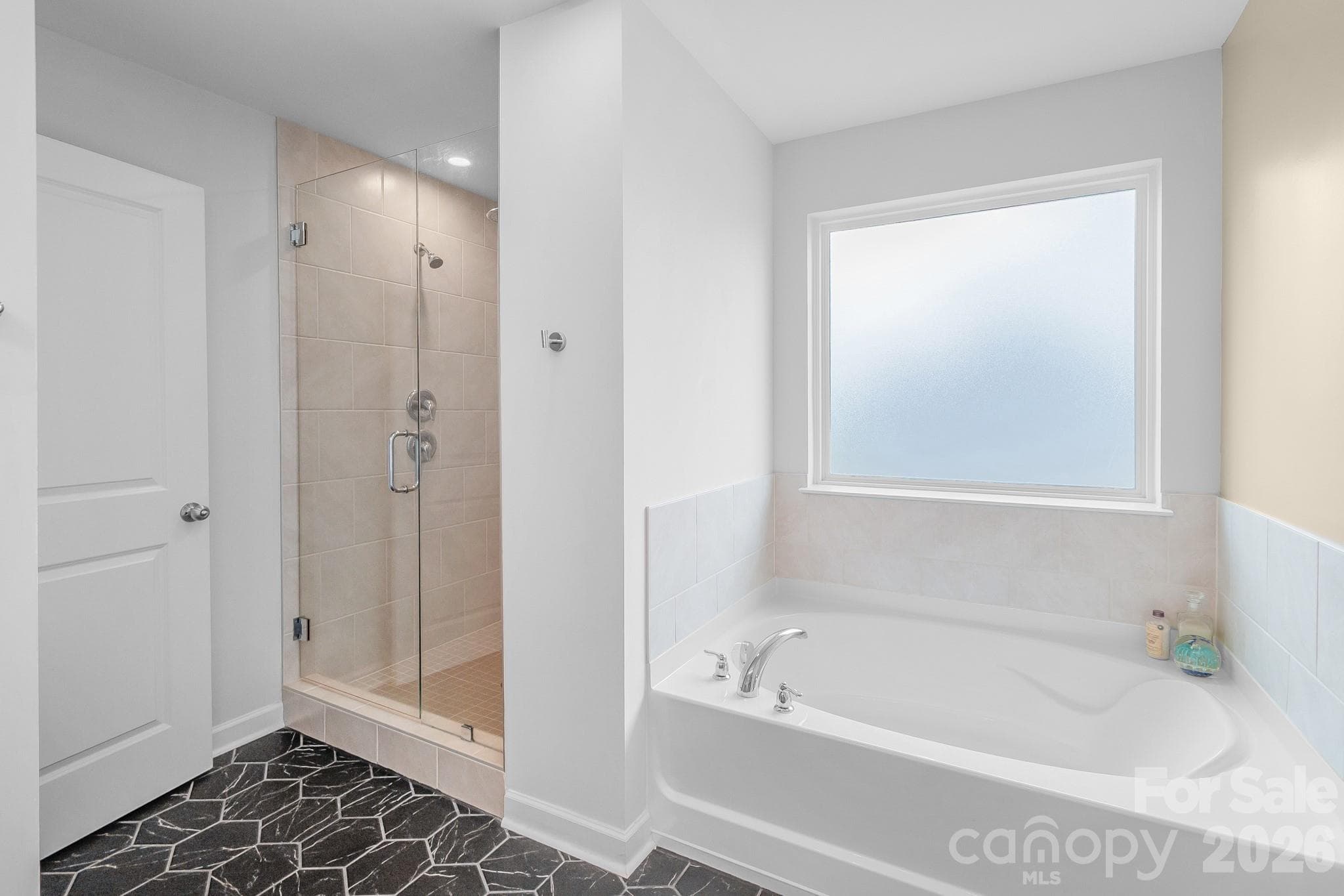 Primary Bathroom with Shower and Tub - 1046 Stone Marker Drive, Monroe