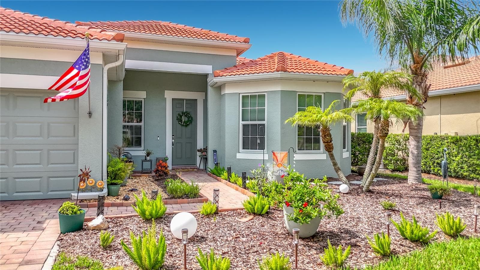 Inviting Front Entry with Tropical Landscaping - 6149 ABACO DR, SARASOTA