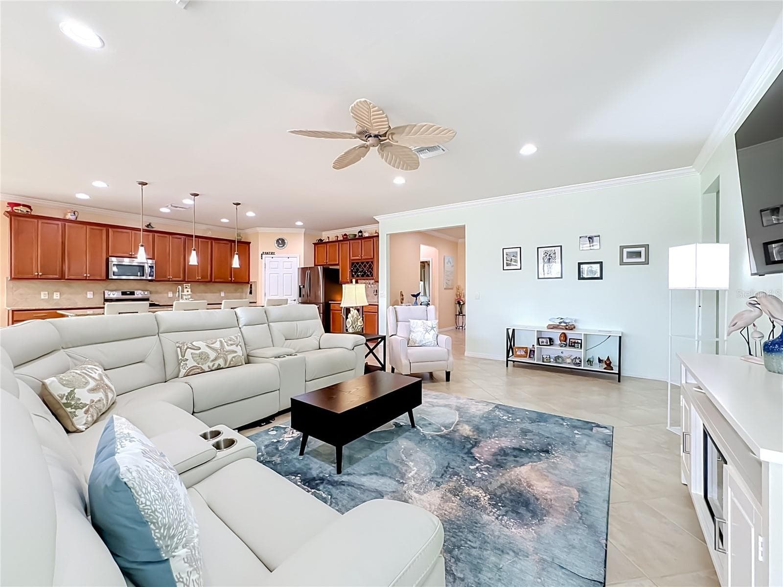 Seamless Flow Between Kitchen and Great Room - 6149 ABACO DR, SARASOTA