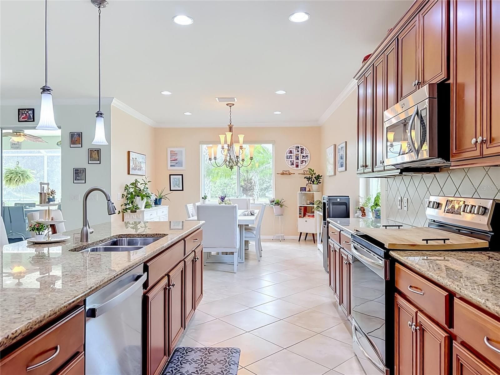 Kitchen Opening to the Dining and Living Areas - 6149 ABACO DR, SARASOTA