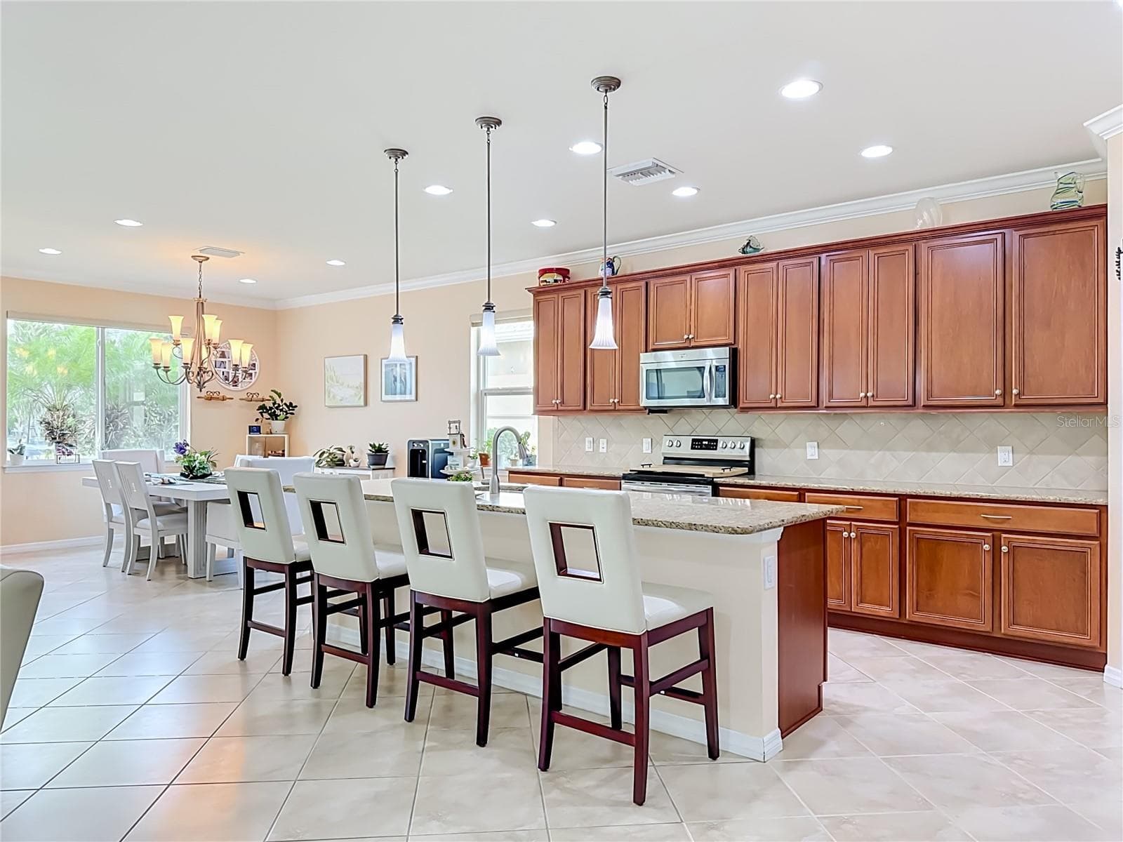 Large Breakfast Bar Beneath Pendant Lighting - 6149 ABACO DR, SARASOTA