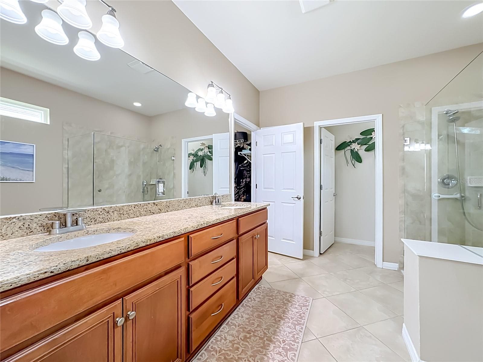 Primary Bathroom with Dual Vanity and Walk-In Shower - 6149 ABACO DR, SARASOTA
