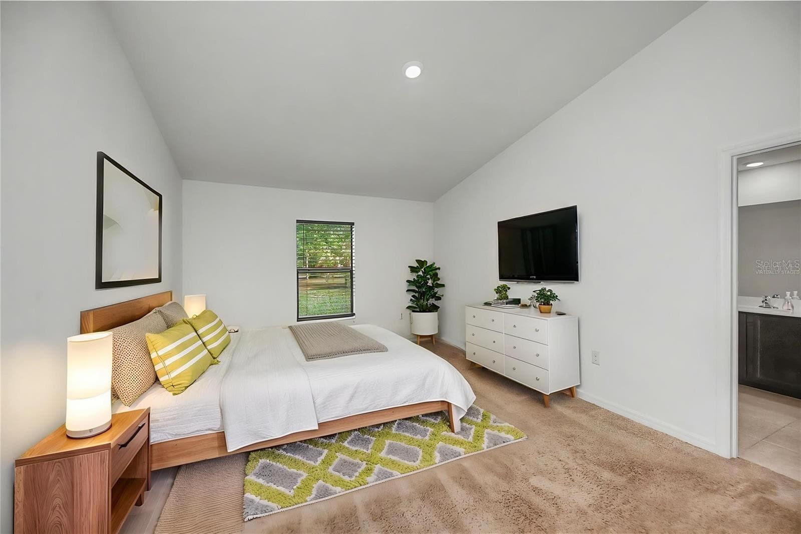 Virtually Staged Spacious Primary Bedroom with Ensuite Bath Access - 2555 ATWATER DR, NORTH PORT