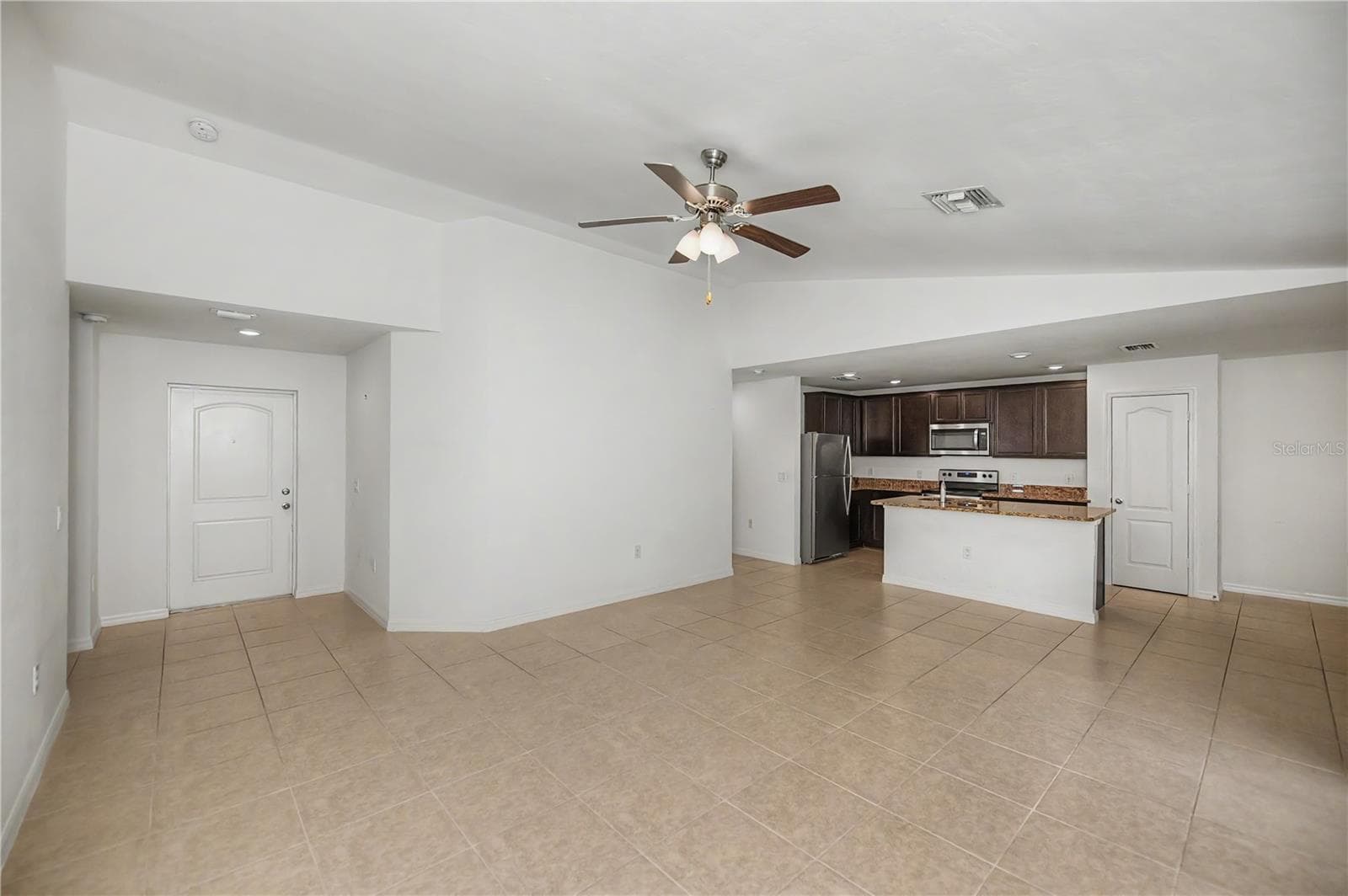 Bright Living Room with Open Flow to Kitchen - 2555 ATWATER DR, NORTH PORT
