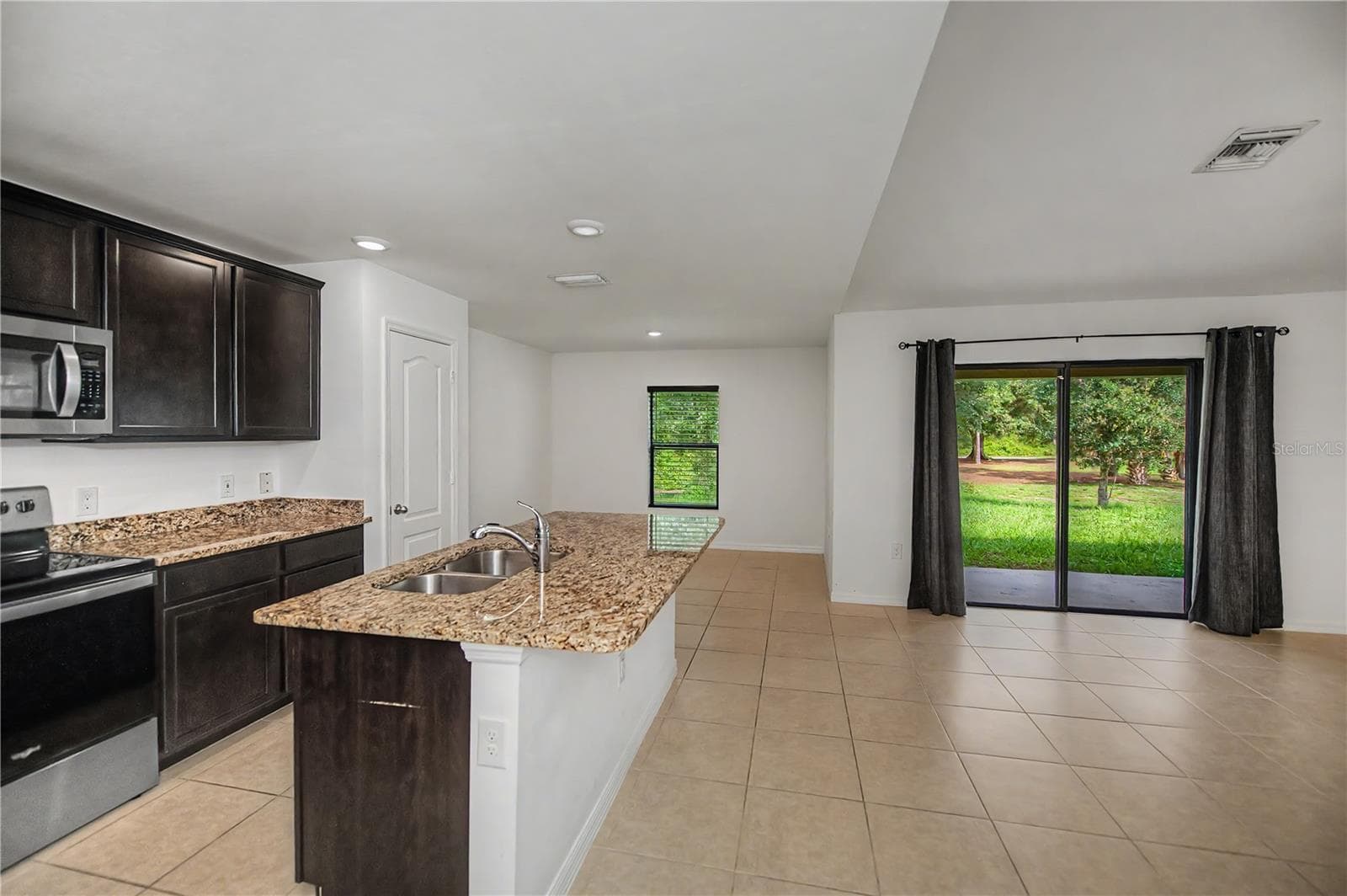 Open Concept Kitchen, Dining and Living Area - 2555 ATWATER DR, NORTH PORT