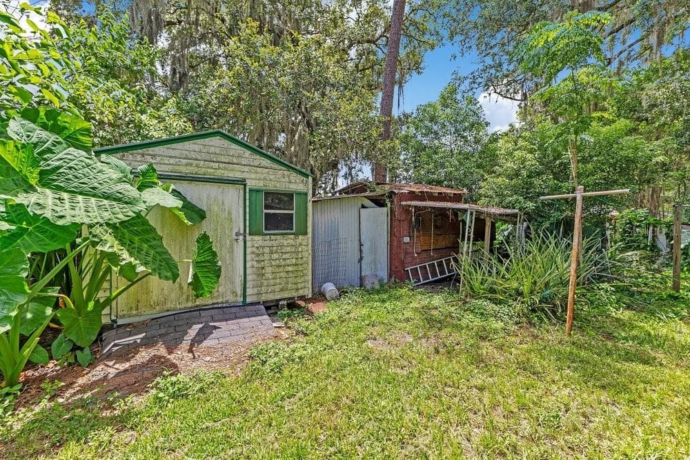Back yard with sheds - 5074 S KALIGA DR, ST CLOUD