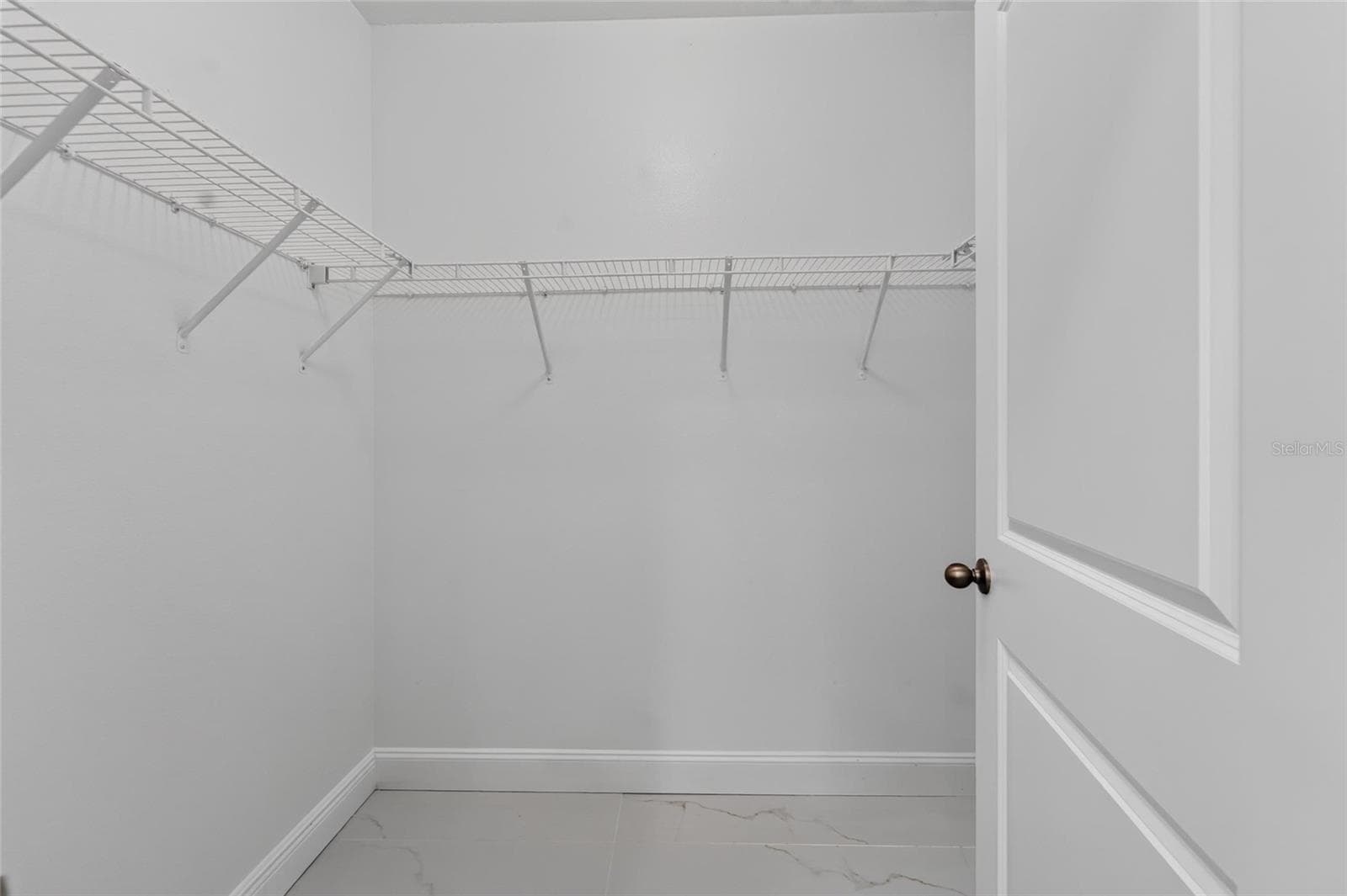 Primary Bedroom Closet 2 of 2 - 9637 TRONCAIS CIR, THONOTOSASSA