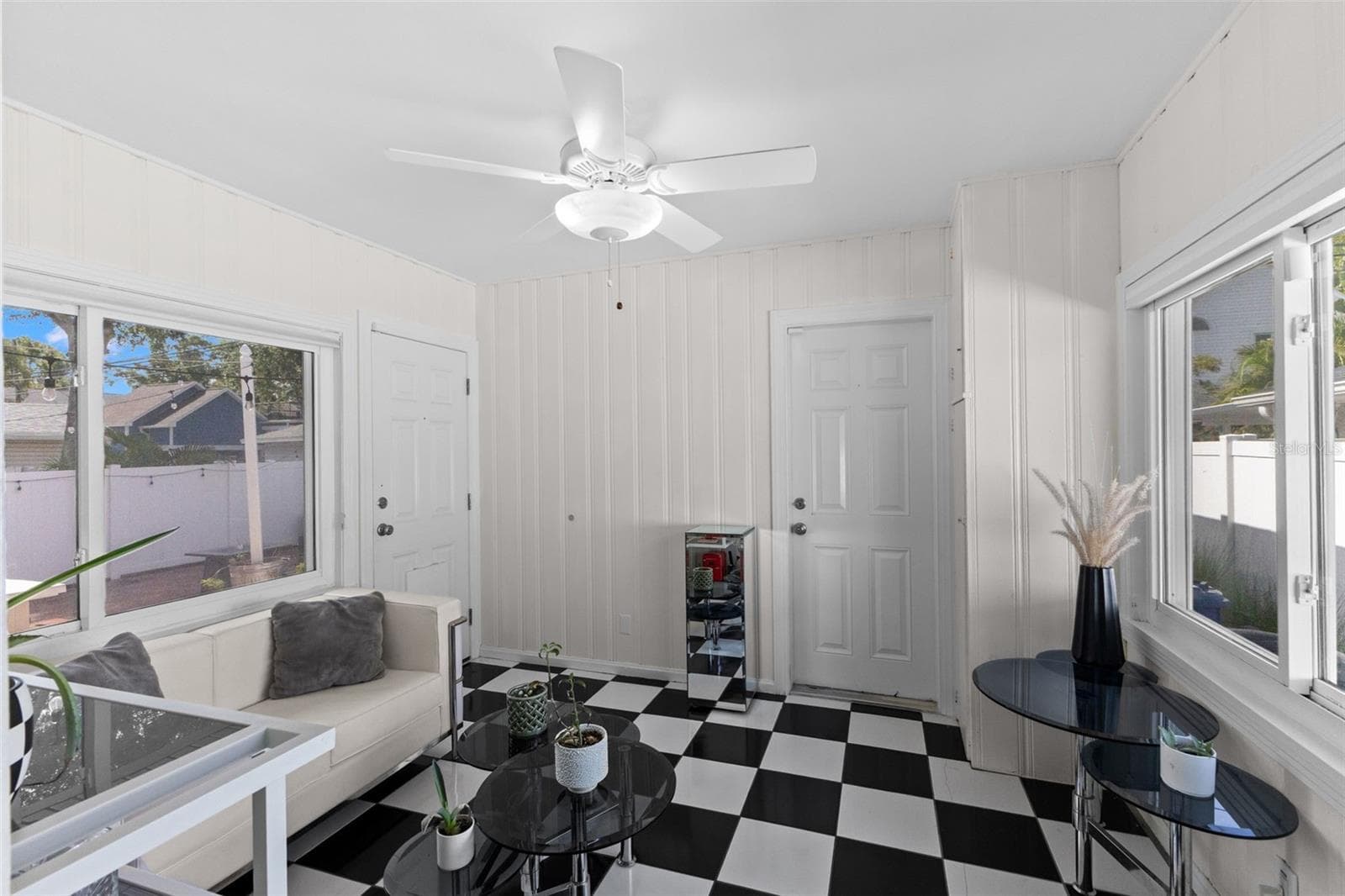 Sun Room with garage entrance straight ahead - 170 22ND AVE N, ST PETERSBURG