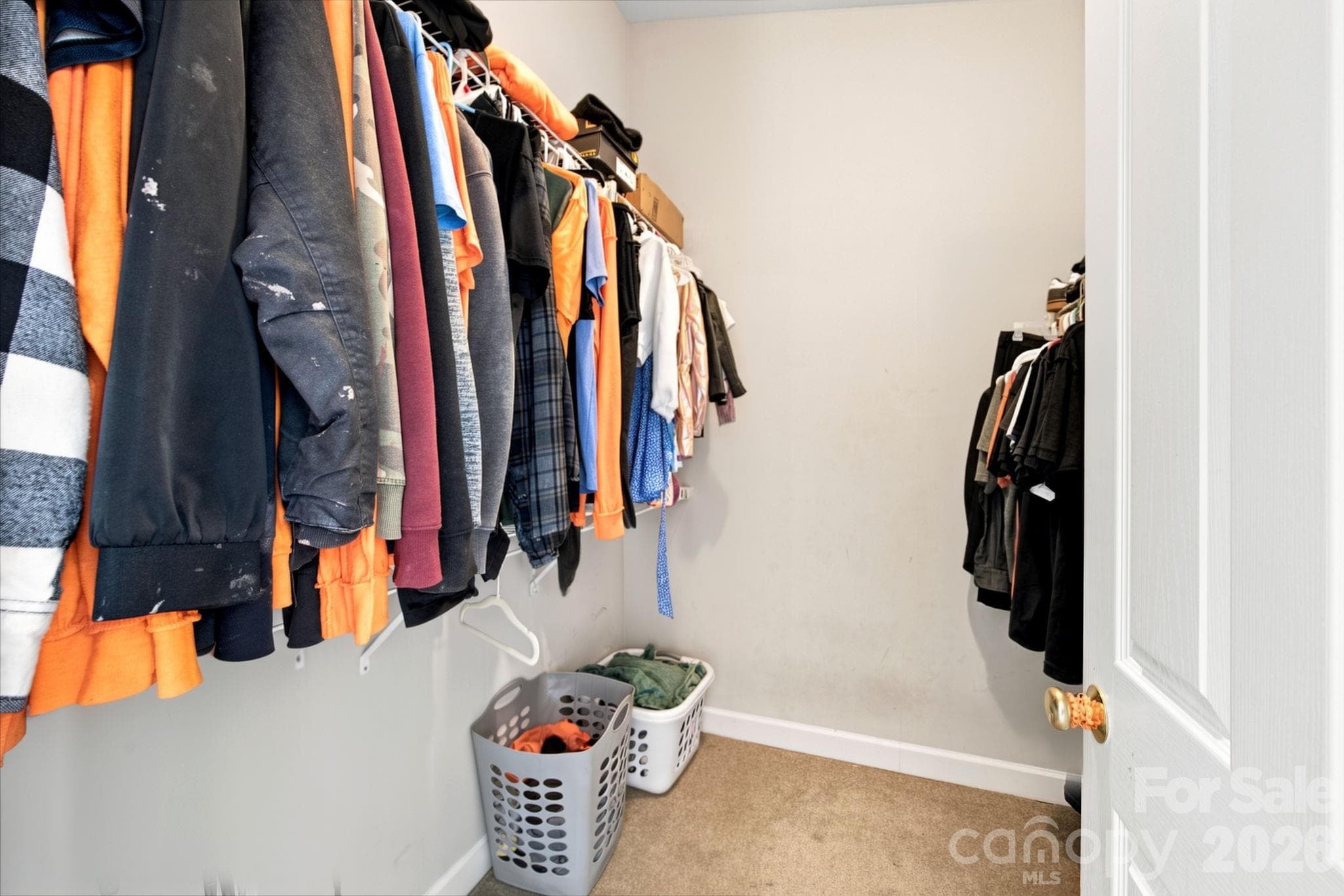 Walk-in Closet located in the Primary en-suite - 17257 Doe Valley Court, Cornelius