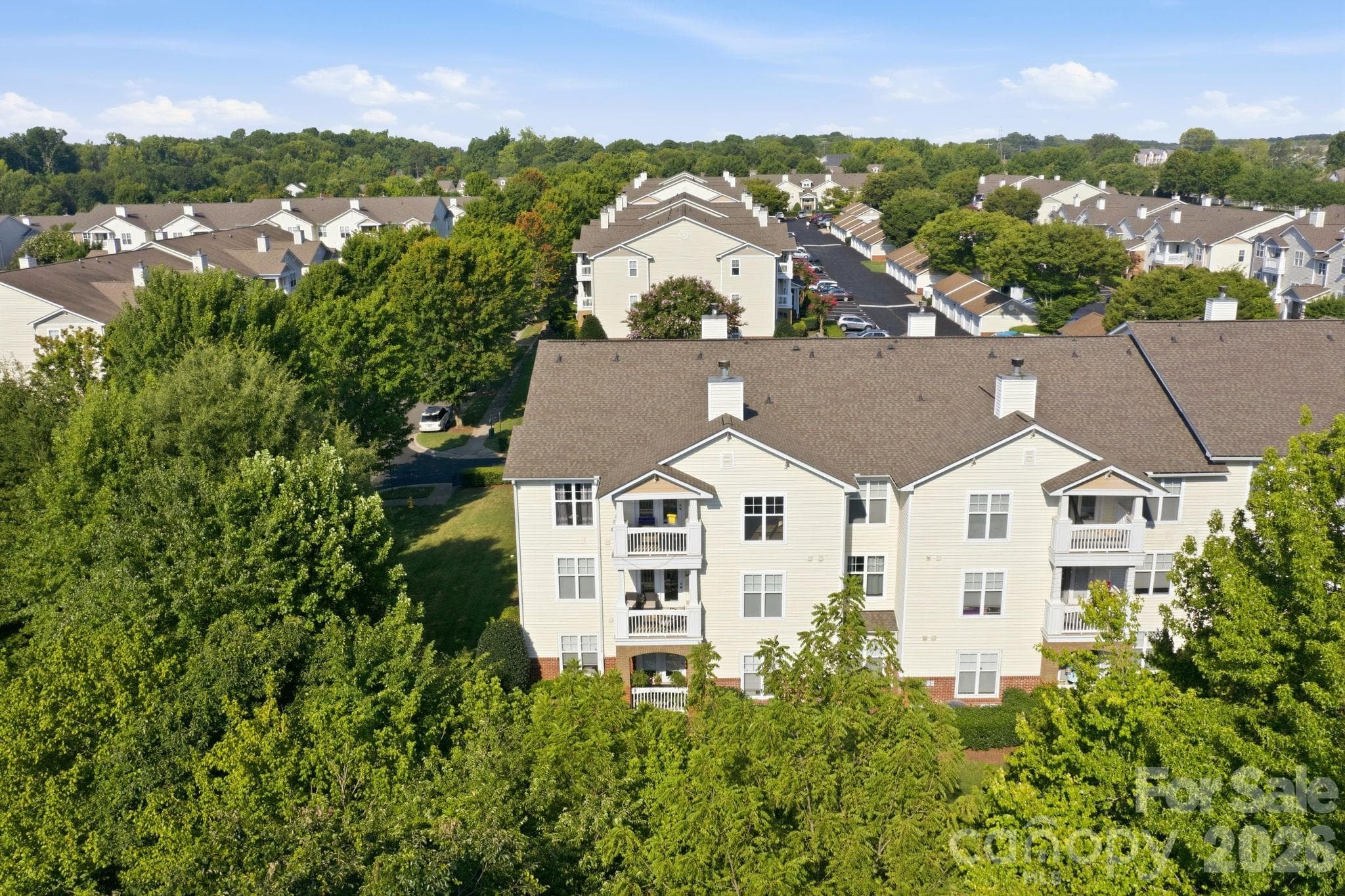 Top Floor Corner Unit surrounded by large, mature, trees - 17257 Doe Valley Court, Cornelius