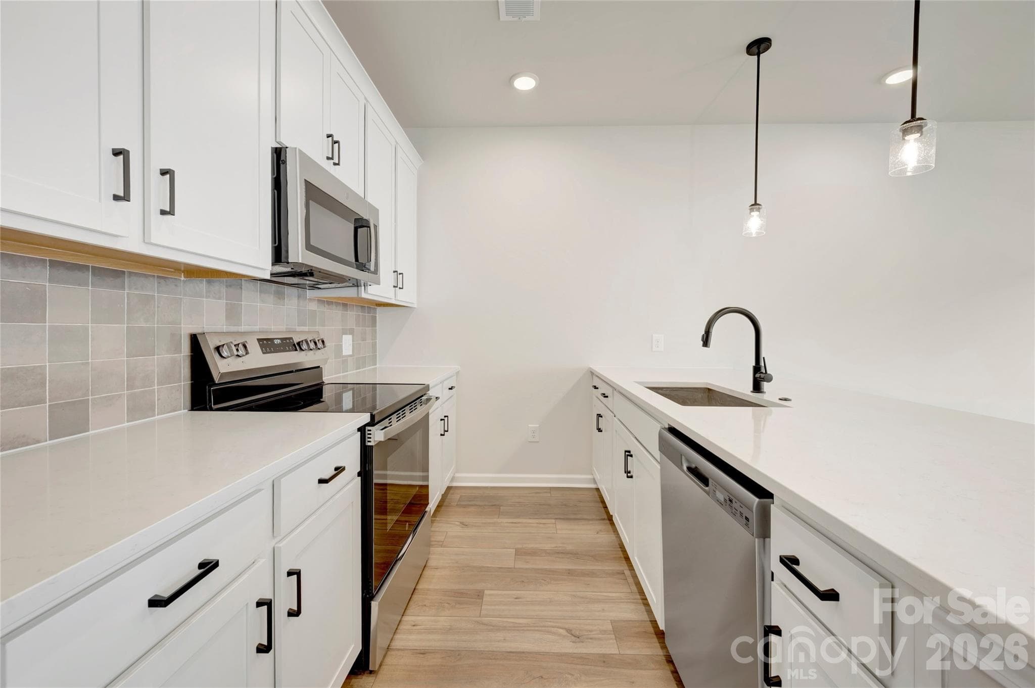 White cabinets and white qurtz countertops - Charlotte
