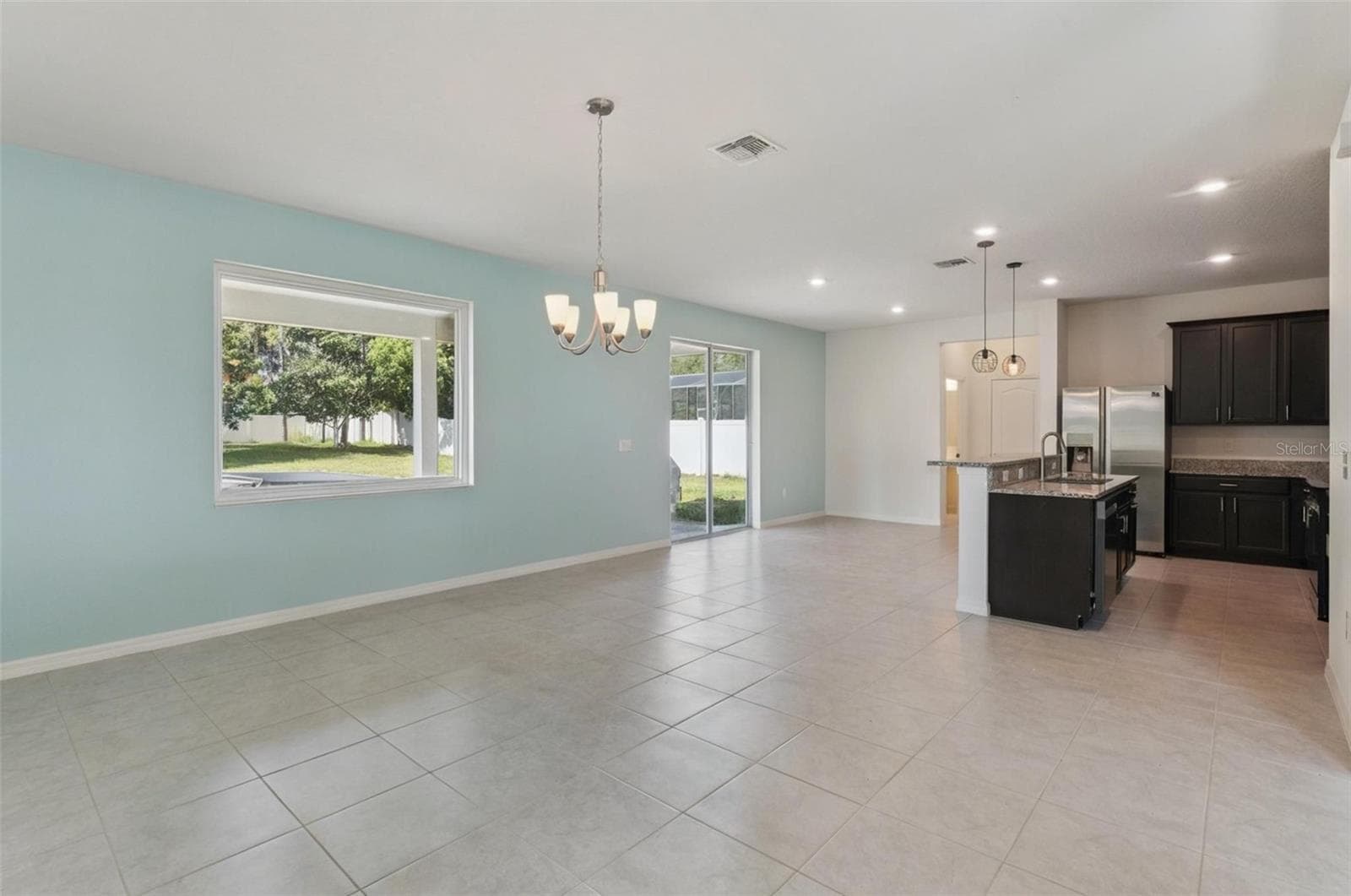 Dining room and kitchen - 15898 BRADICKS CT, CLERMONT