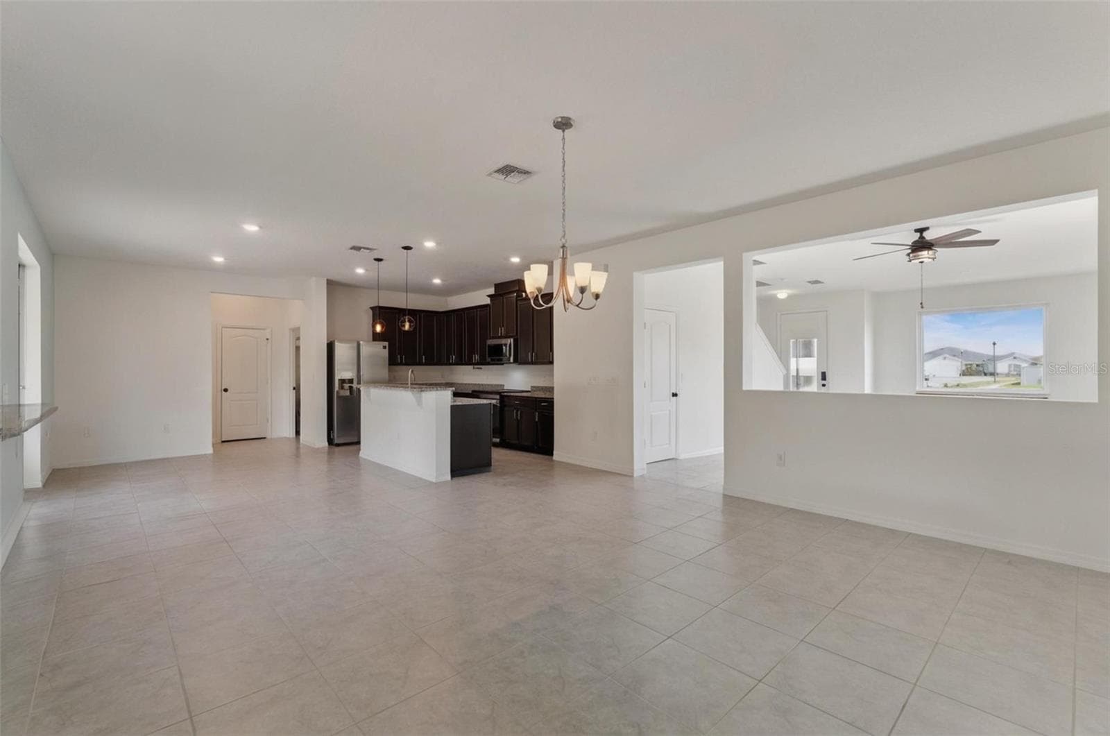 Dining room and kitchen - 15898 BRADICKS CT, CLERMONT