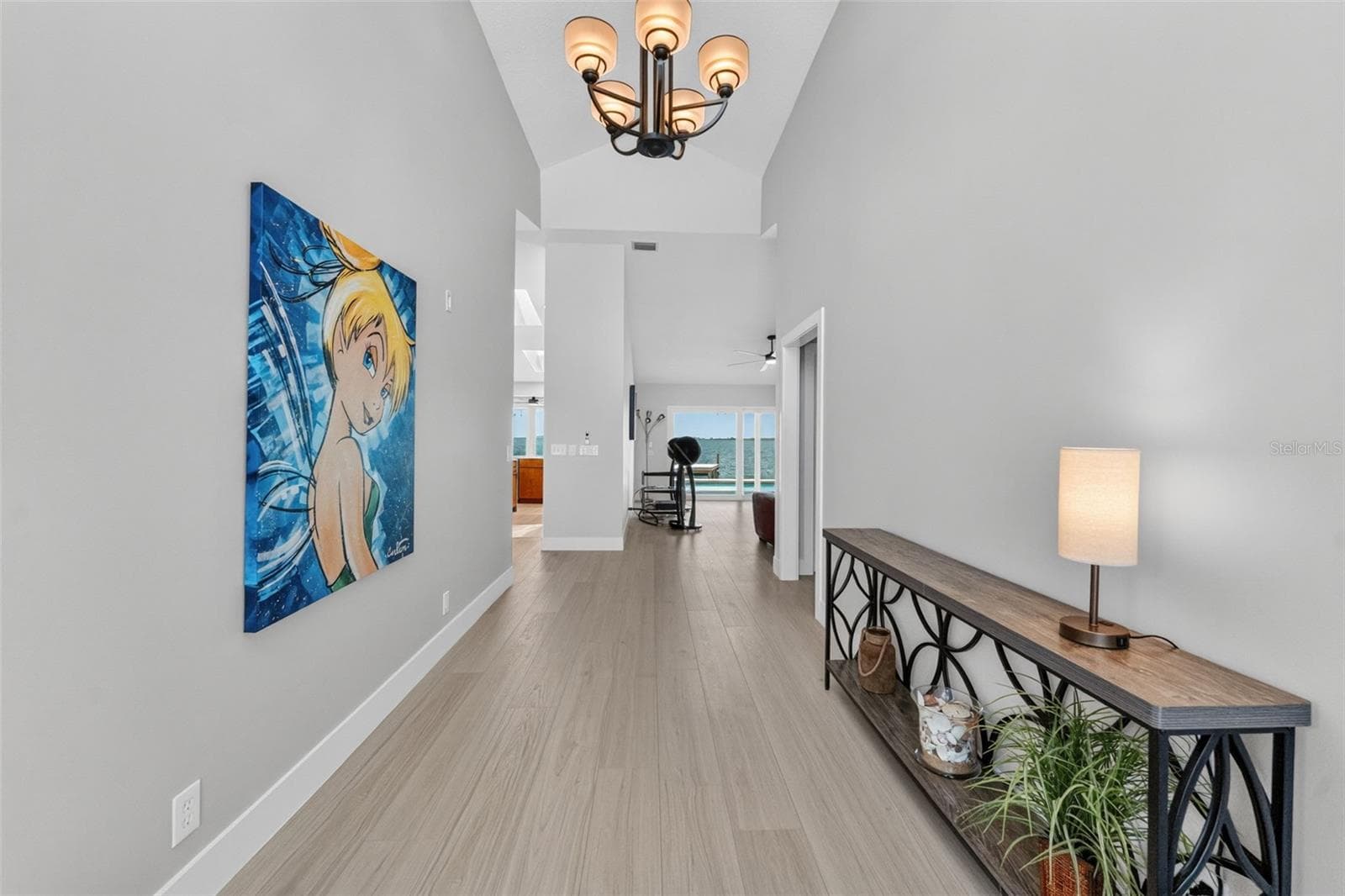 Grand foyer with soaring vaulted ceilings, setting the tone for the spacious and elegant design throughout the home. - 2936 68TH AVE S, ST PETERSBURG