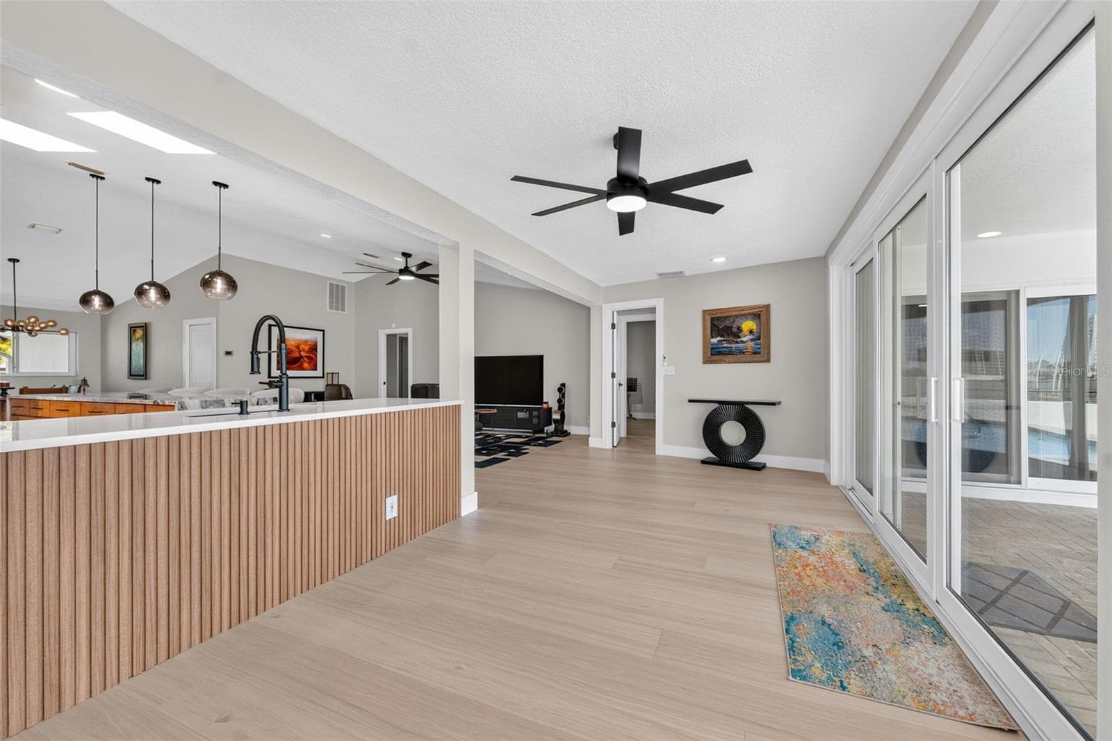 Bonus room with new ceiling fan offering flexible options for its use. - 2936 68TH AVE S, ST PETERSBURG