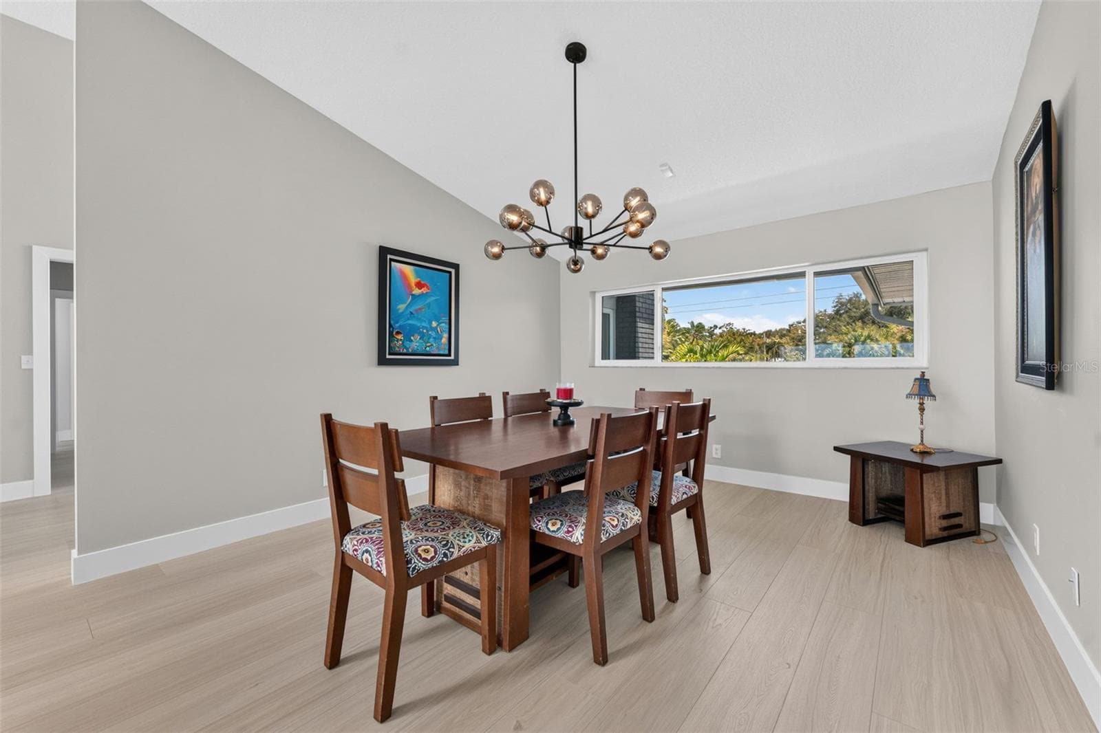 Open and airy dining room ideal for seamless entertaining and family gatherings. - 2936 68TH AVE S, ST PETERSBURG