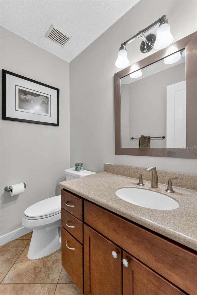 Half bathroom located right off bedroom 2 - 2936 68TH AVE S, ST PETERSBURG