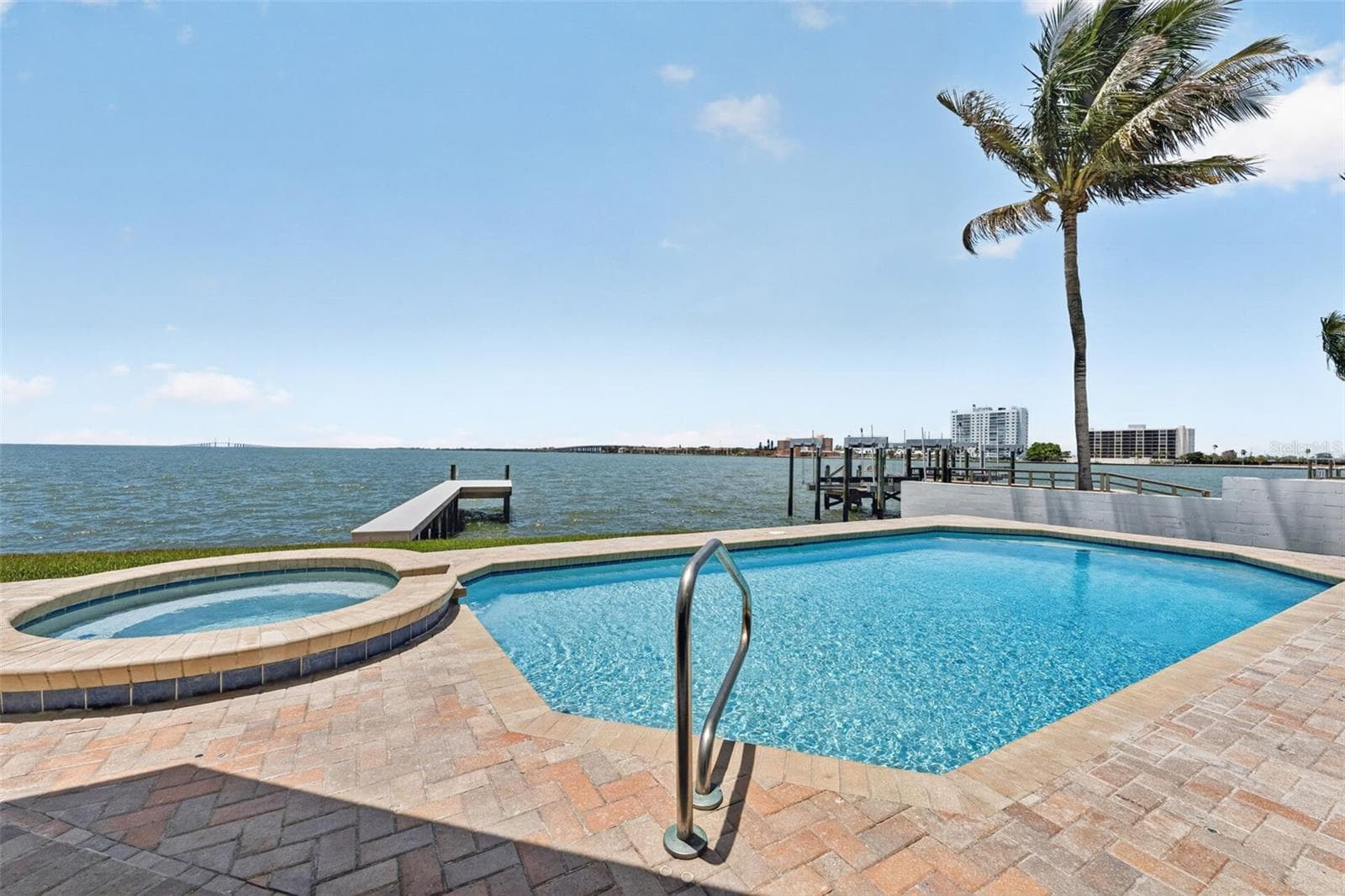 Saltwater pool with breathtaking open water views, creating a perfect spot for swimming and relaxation. - 2936 68TH AVE S, ST PETERSBURG