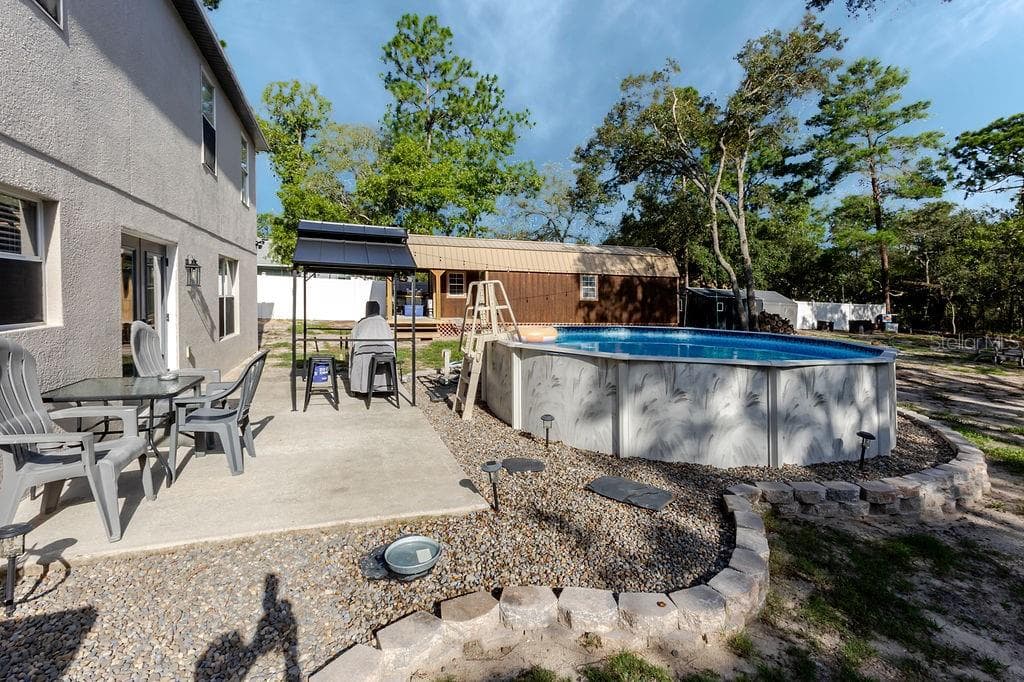 Patio With Pool - 11083 MAYBIRD AVE, WEEKI WACHEE