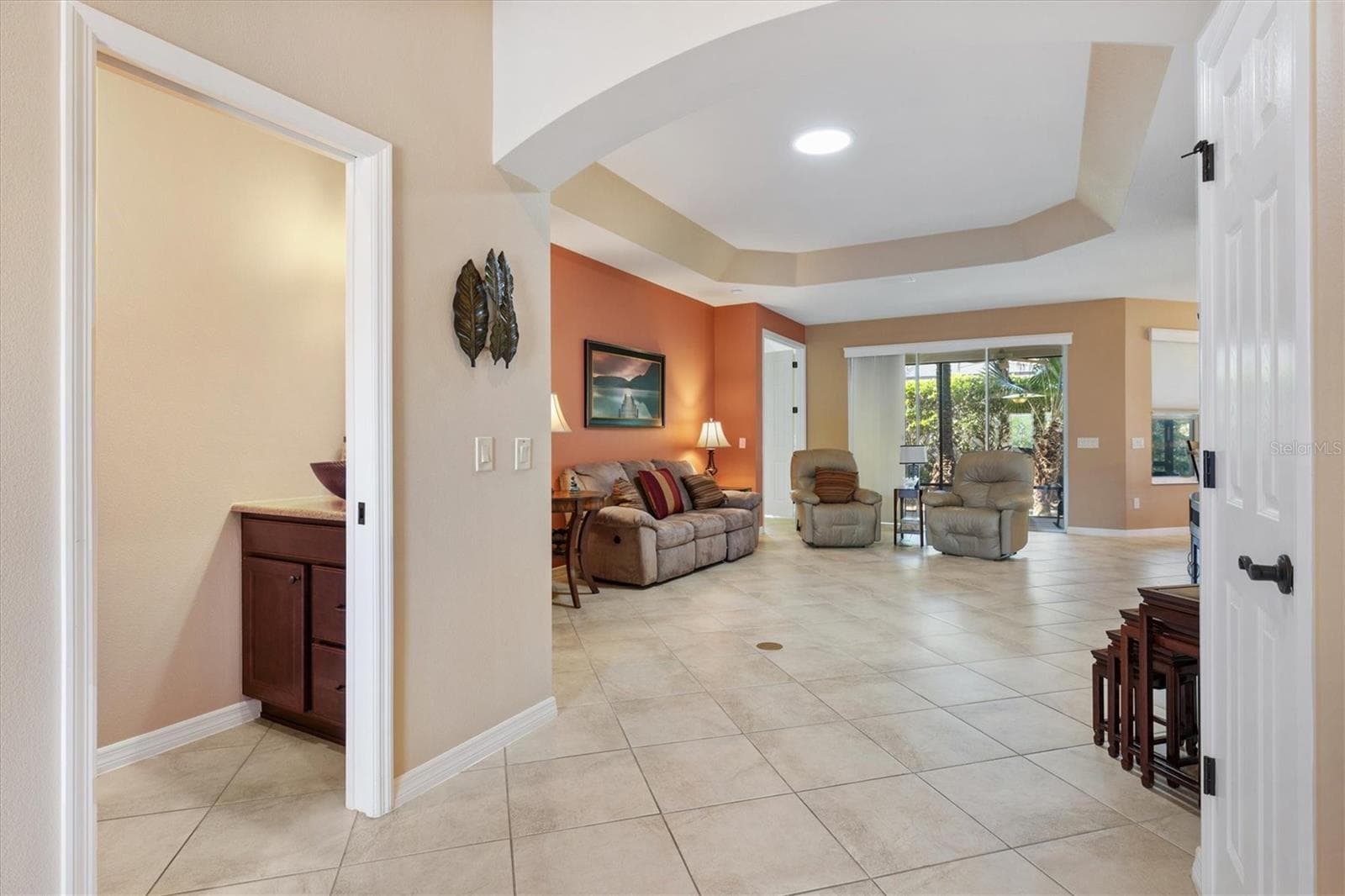 Foyer showing Half Bath and Living Room - 1304 BRUNELL ST, THE VILLAGES