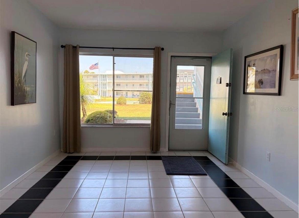 Living room 18X11 with lots of natural light - 3009 N HALIFAX AVE #2, DAYTONA BEACH