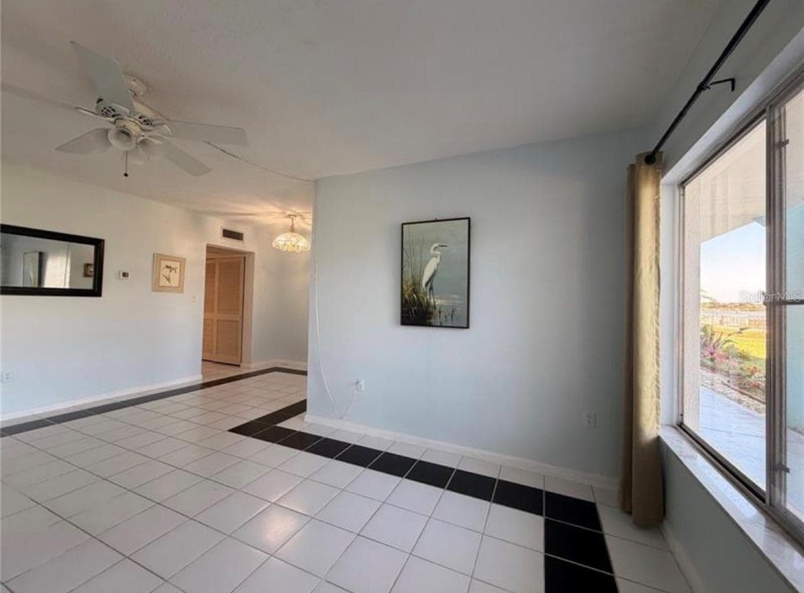 Living room 18X11 with lots of natural light - 3009 N HALIFAX AVE #2, DAYTONA BEACH