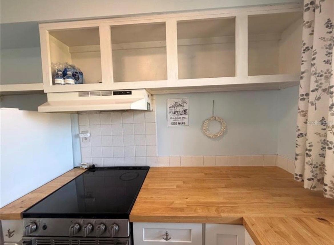 Kitchen 9X7 with open shelving - 3009 N HALIFAX AVE #2, DAYTONA BEACH
