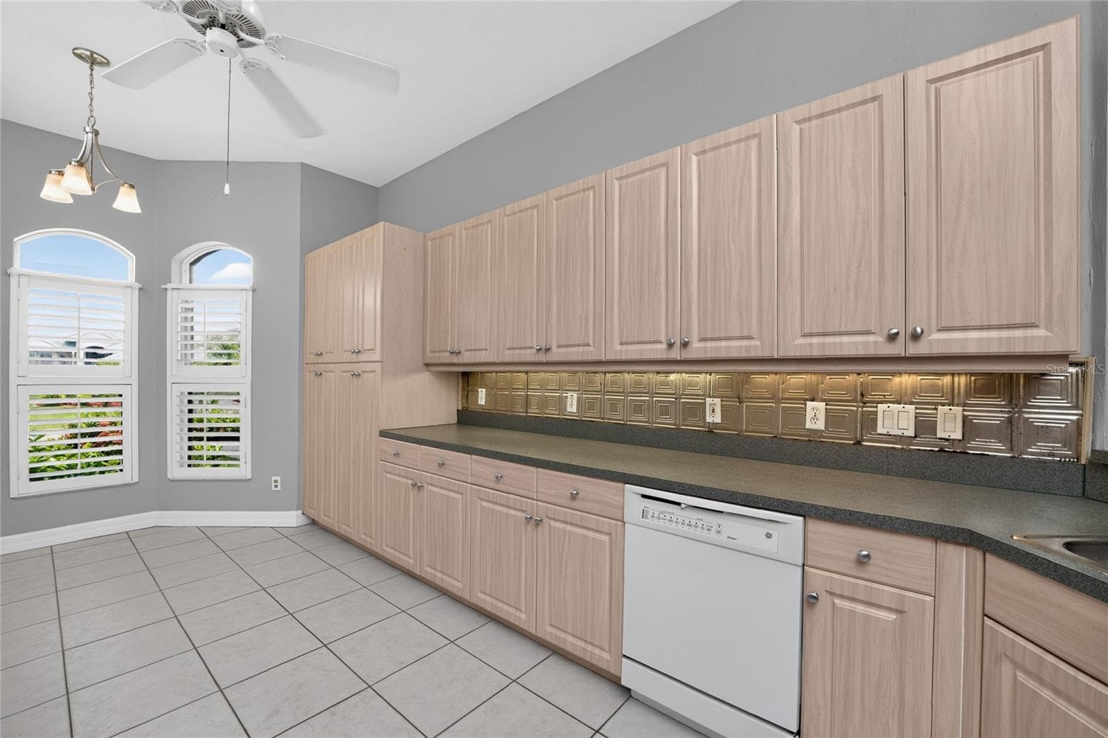 Kitchen with dinette in the background. - 1611 ATARES DRIVE #Unit 111, PUNTA GORDA