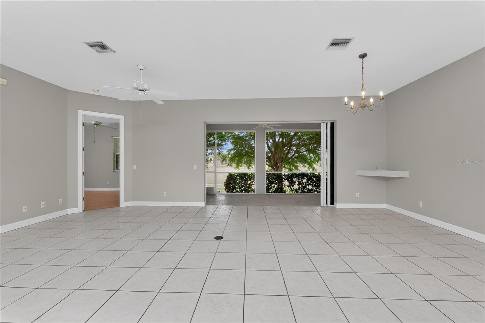 Great room and dining area. - 1611 ATARES DRIVE #Unit 111, PUNTA GORDA