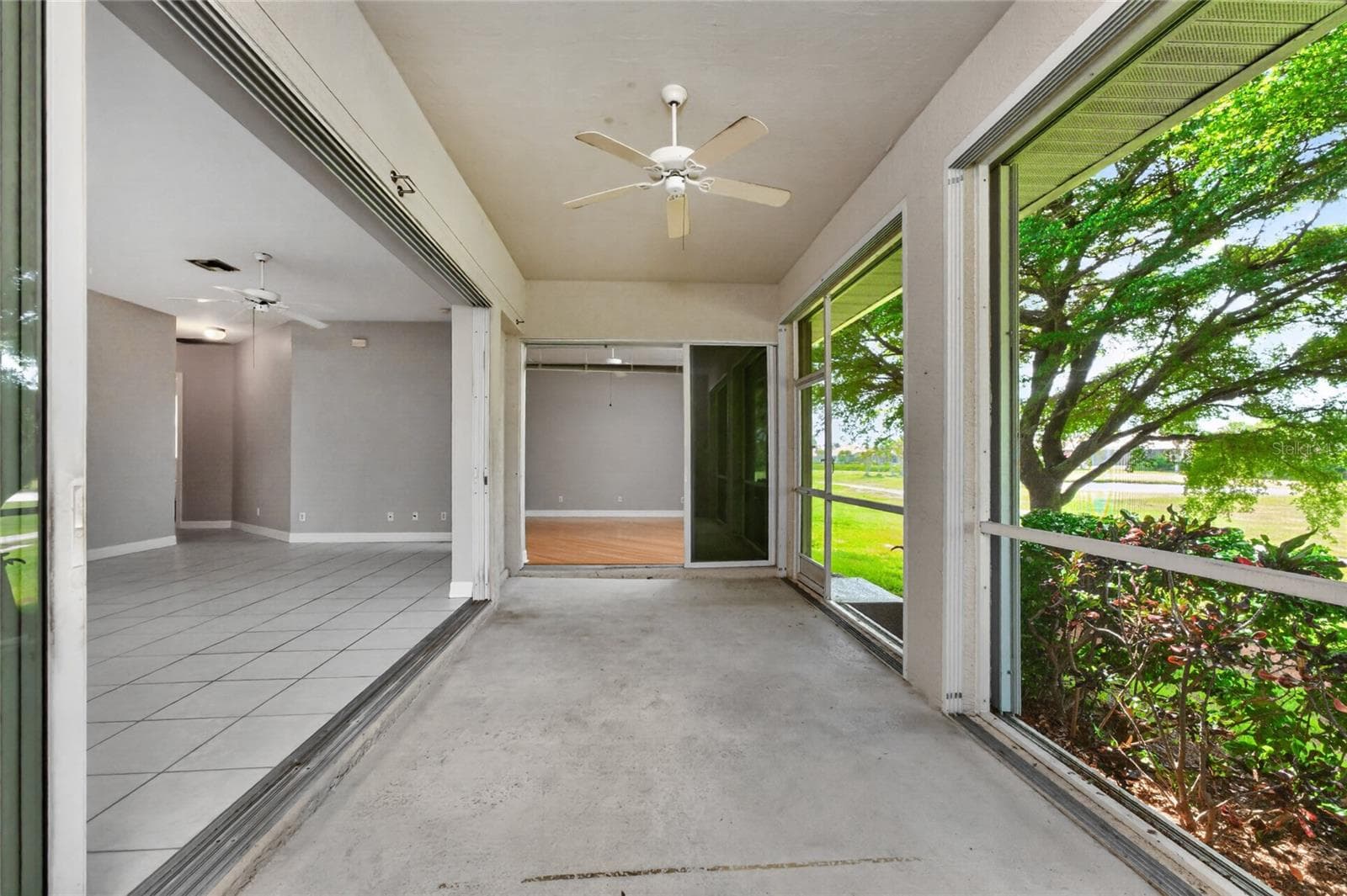 Lanai with the master bedroom on the far end. - 1611 ATARES DRIVE #Unit 111, PUNTA GORDA