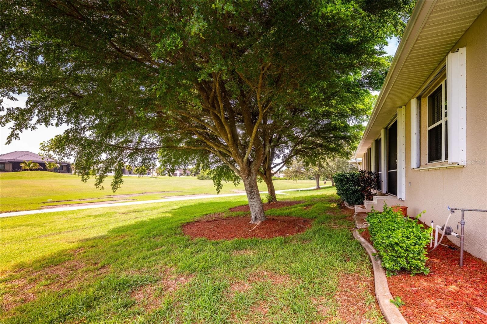 Rear, side elevation. - 1611 ATARES DRIVE #Unit 111, PUNTA GORDA