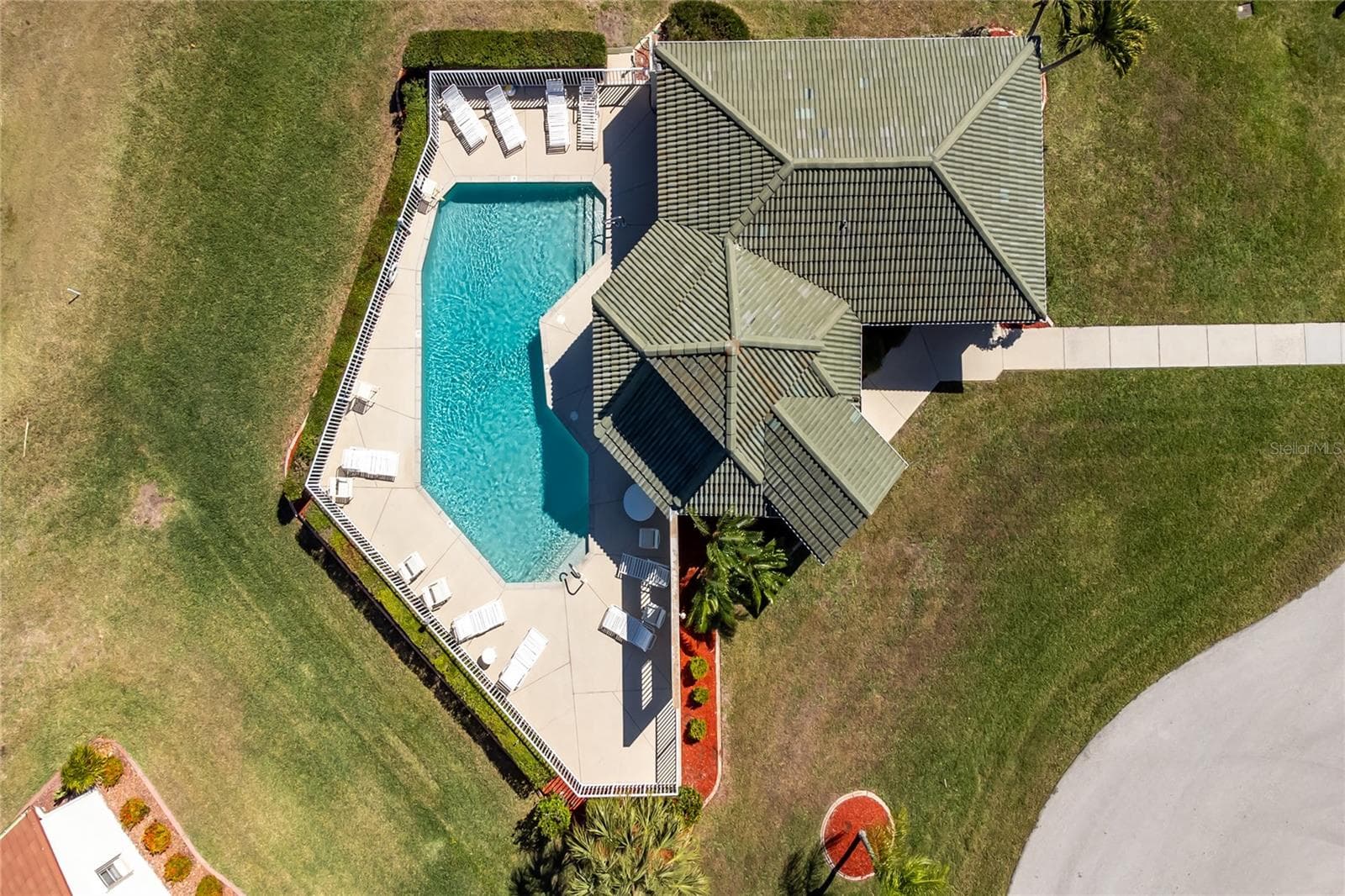 Aerial of The Villas of Versailles and the clubhouse and pool. - 1611 ATARES DRIVE #Unit 111, PUNTA GORDA