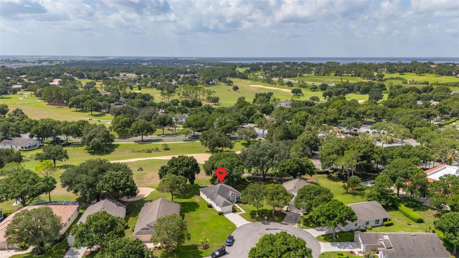 Another view of 3604 Kingswood Court and it's proximity to the 18th hole and Kings Ridge Club House - 3604 KINGSWOOD CT, CLERMONT