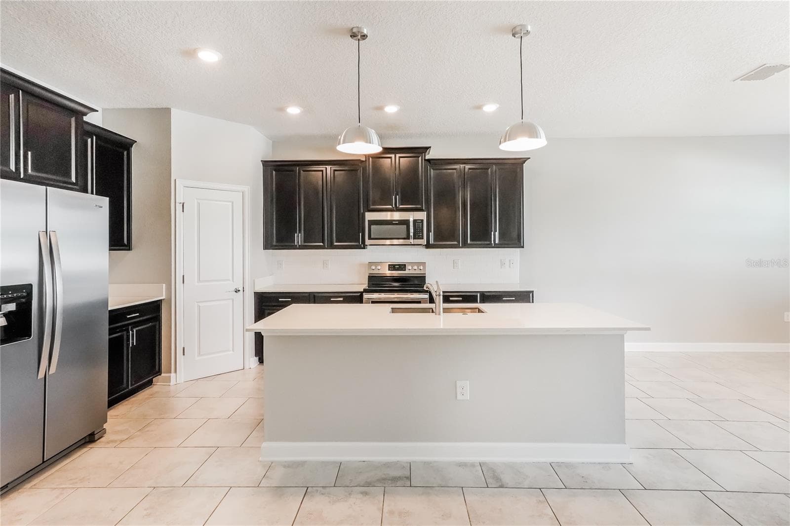 Single Family Residence at 2344 CRESCENT MOON ST, KISSIMMEE, photo 4 of 15