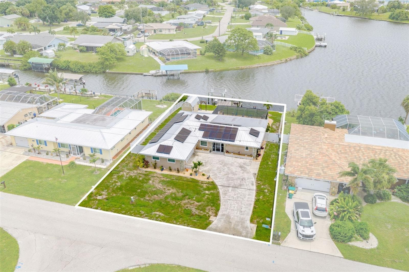 Saltwater Lakefront Living with Solar Savings - 2284 BROAD RANCH DR, PORT CHARLOTTE